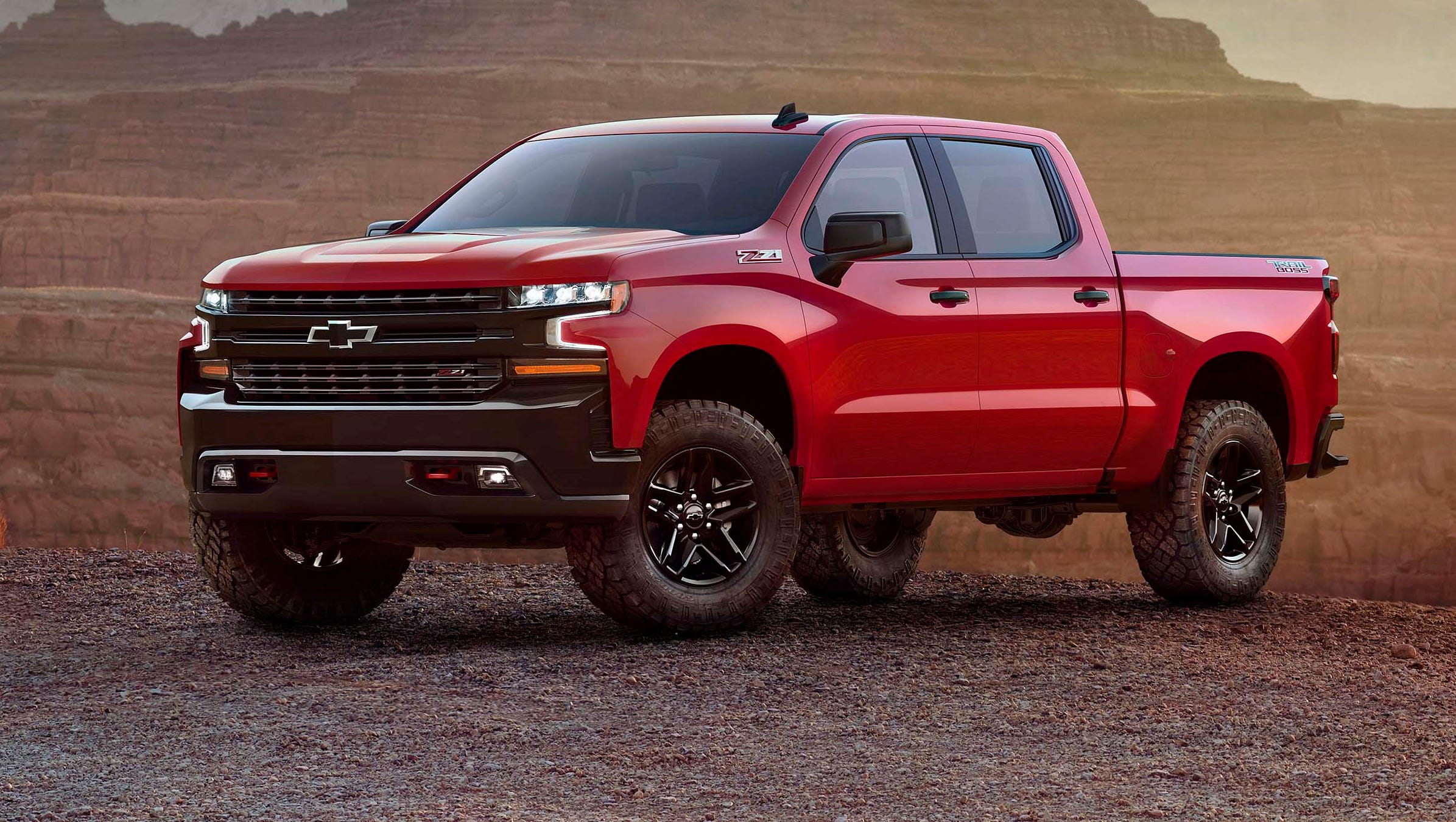 The 2019 Chevy Silverado gets an all-new look for 2019 with thinner headlights, a more sculpted body, and mirrors mounted on the doors for better visibility.