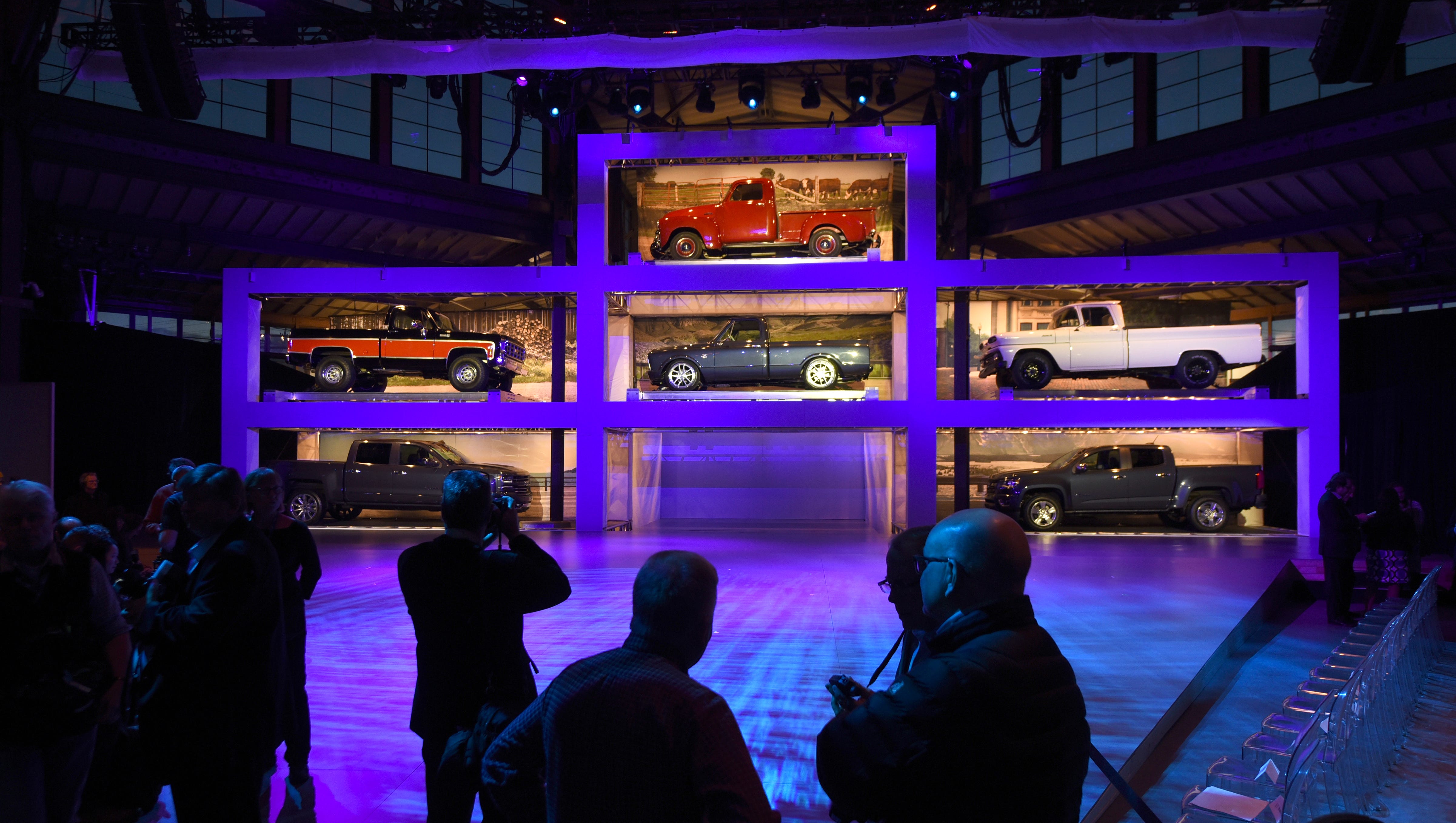 General Motors stages an era of trucks on stage before they unveil the 2019 Chevy Silverado truck editions at Eastern Market's Shed 3.