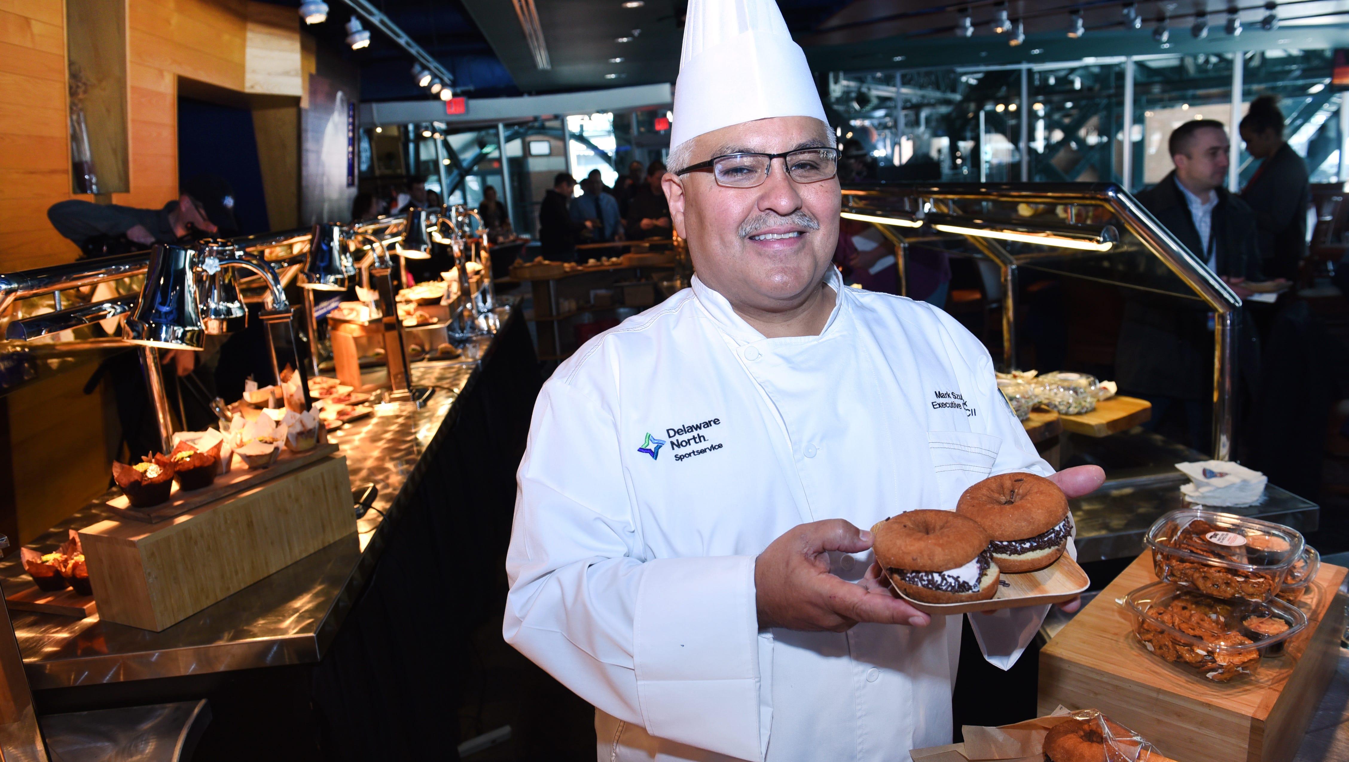 Mark Szubeczak, executive chef, Comerica Park, unveils his latest creation, the donut ice cream sandwich.