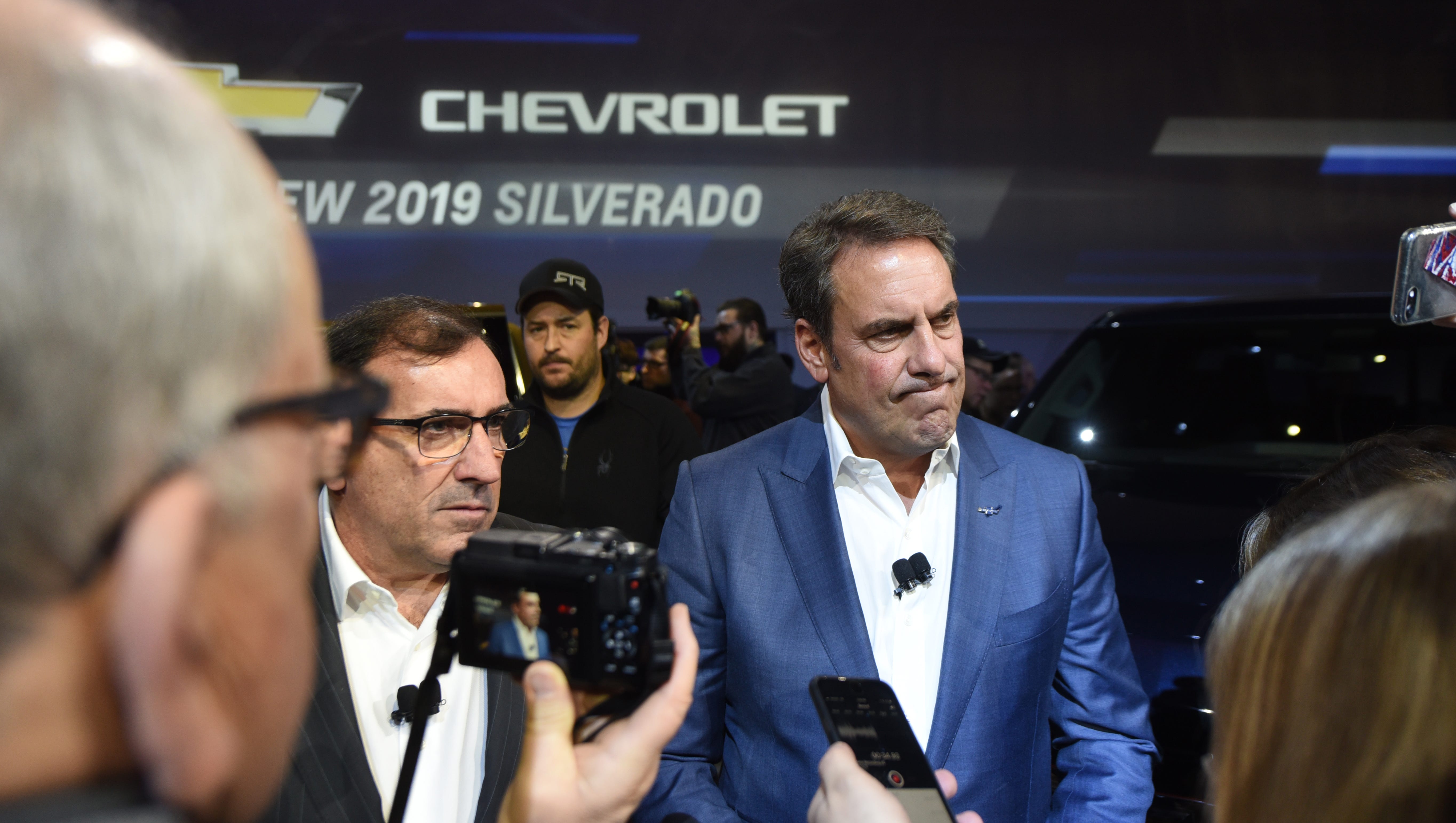 Mark Reuss (center), Executive VP Global Product Development, GM, and Alan Batey, President GM, North America, speak to the media after the Silverado's unveiling.