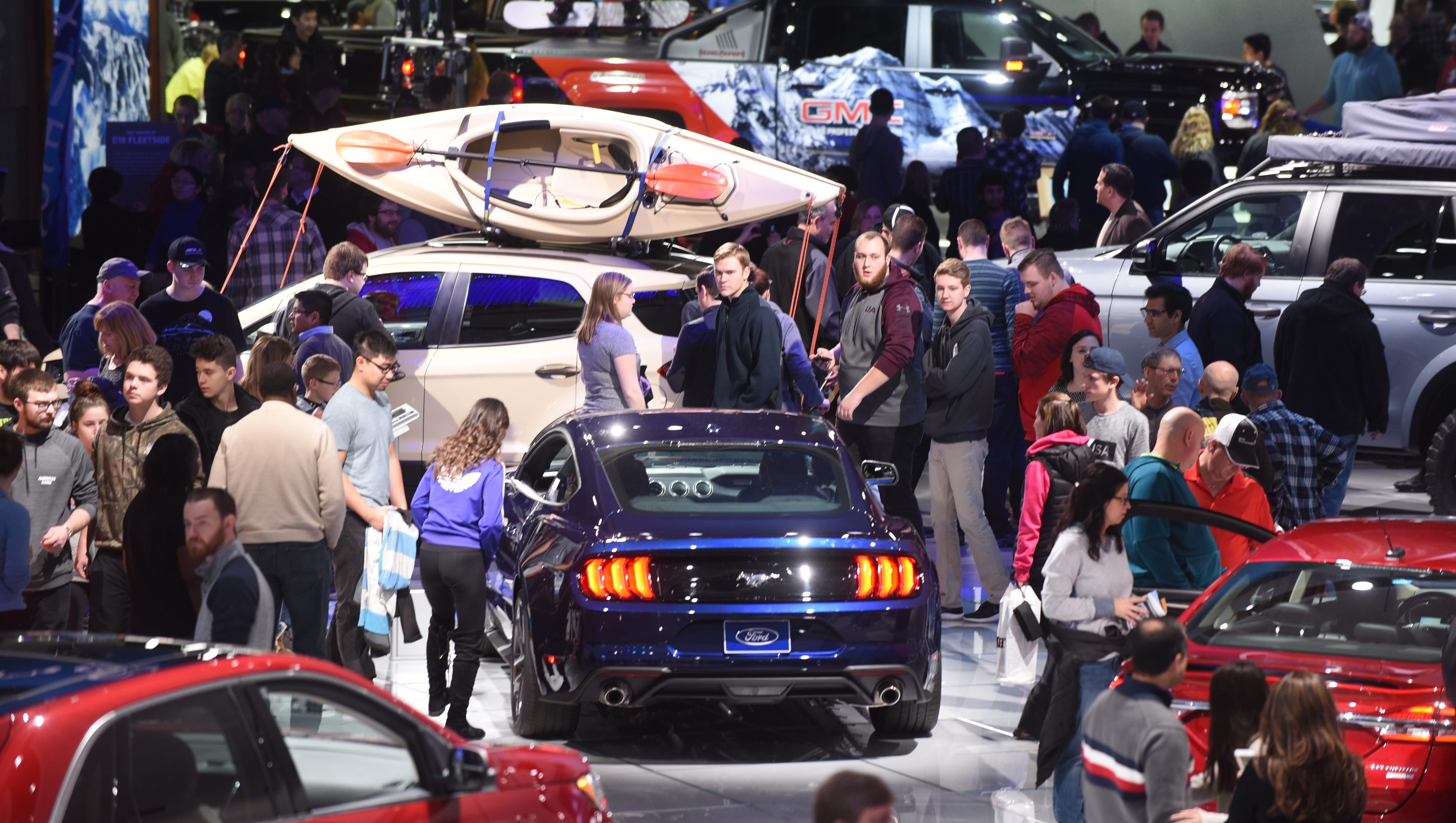 People look at the many Ford vehicles on display at Cobo Center on Saturday January 20, 2018, for the first public day of the North American International Auto Show