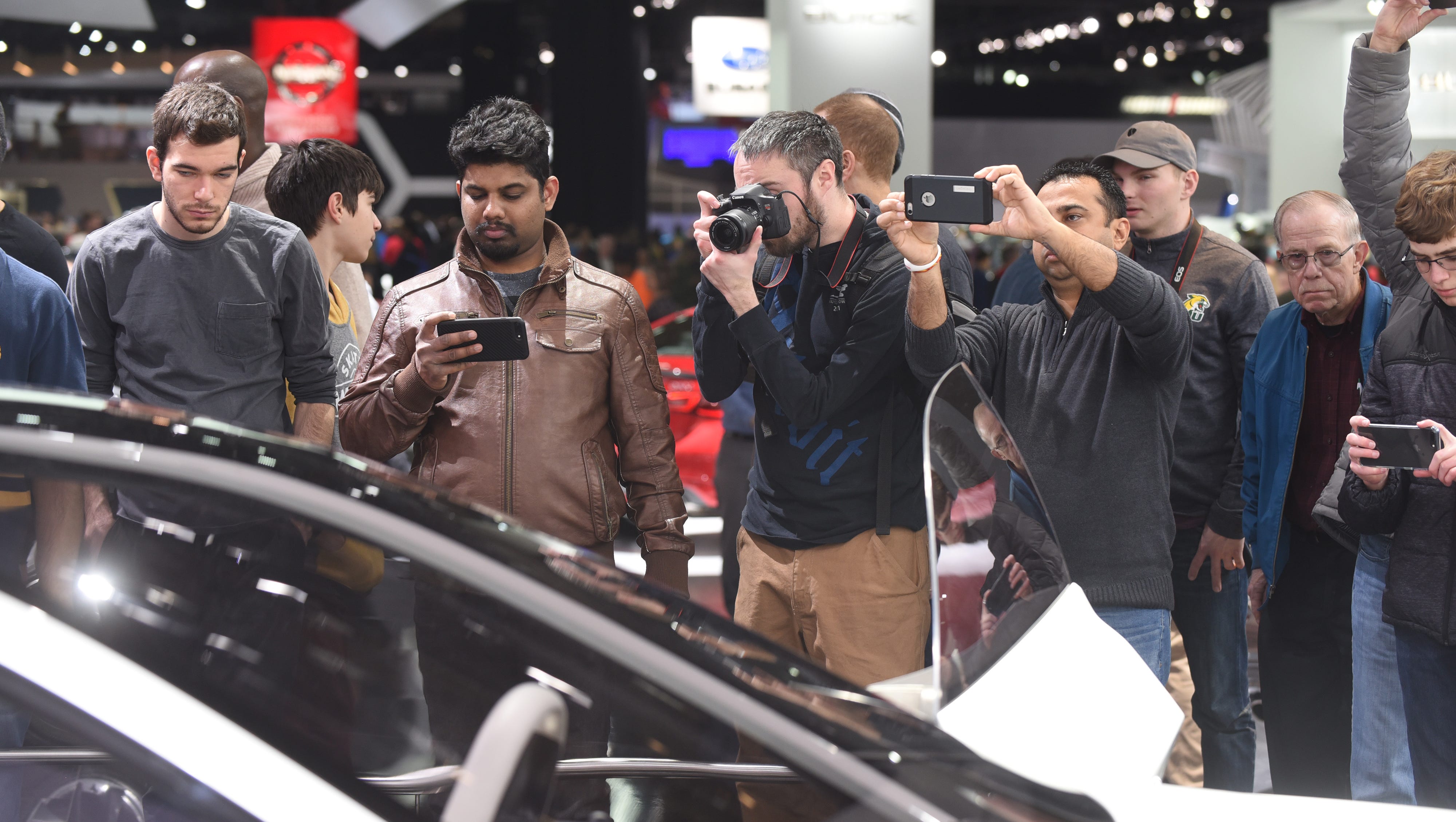 People photograph the Infiniti Q Inspiration Concept on Saturday January 20, 2018 for the first public day for the North American International Auto Show