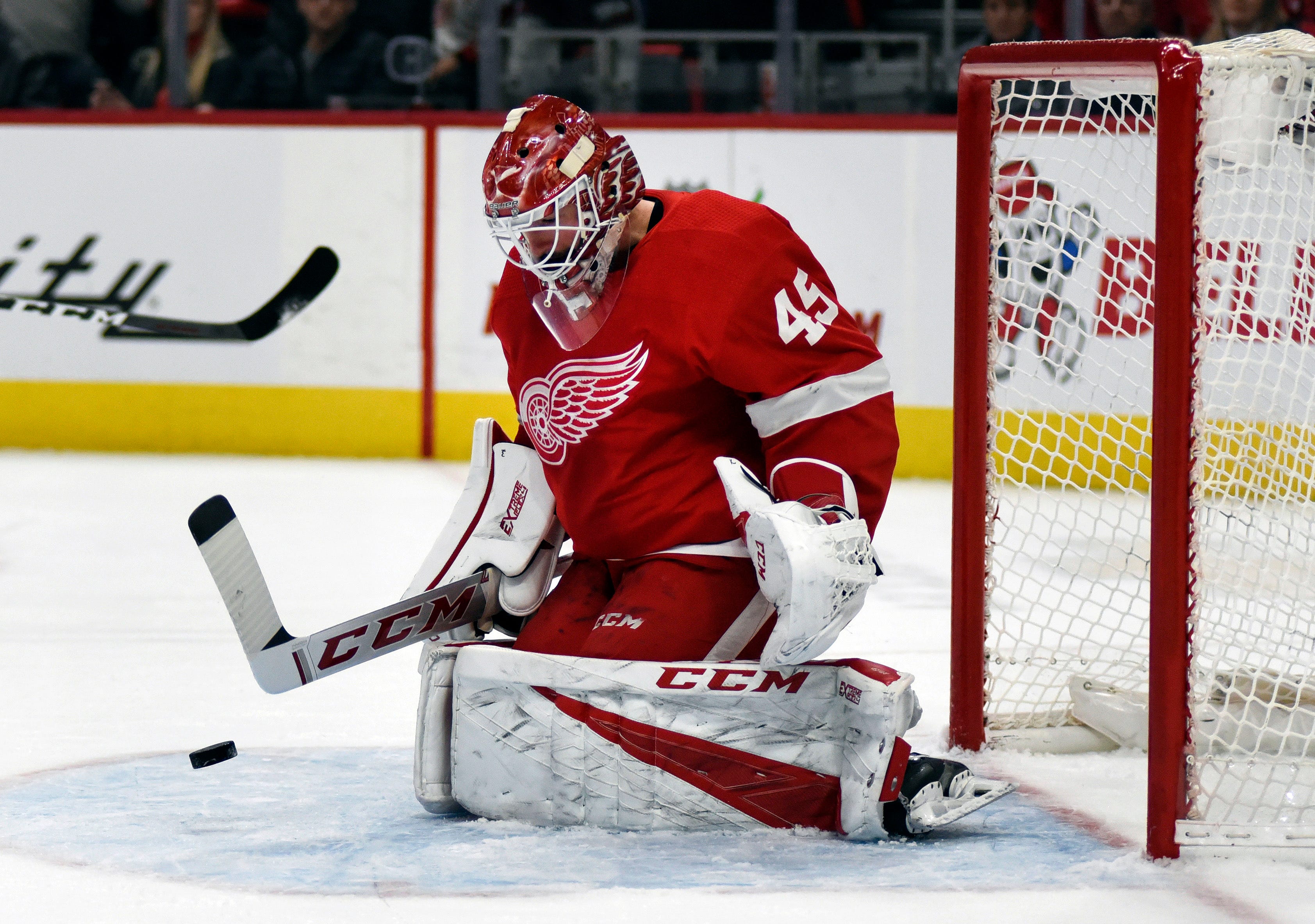 Red Wings goaltender Jonathan Bernier deflects a shot by the Avalanche in the first period.