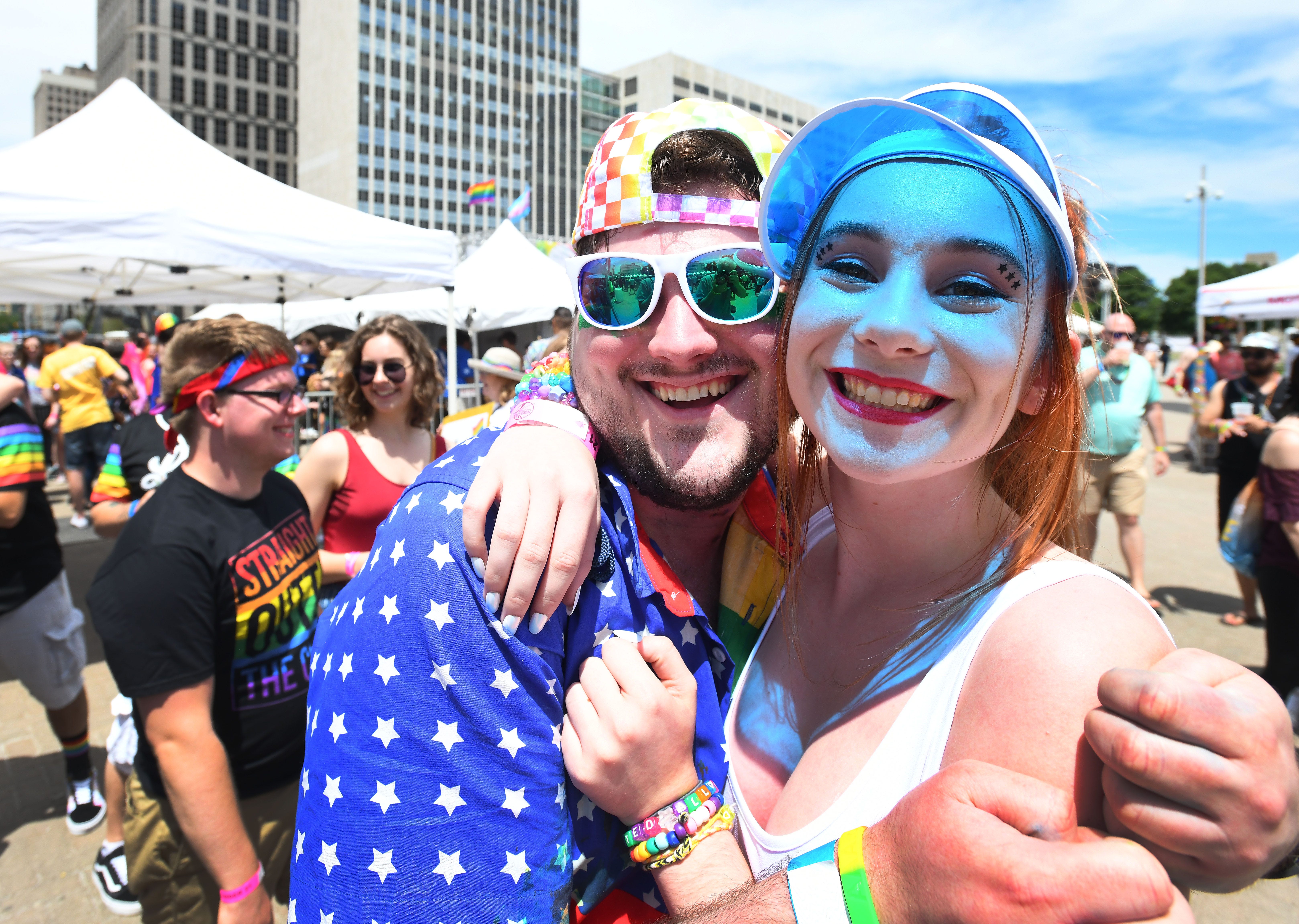 Alex Rogosch and Jessie Miller are all smiles as they arrive at the Motor City Pride festival.