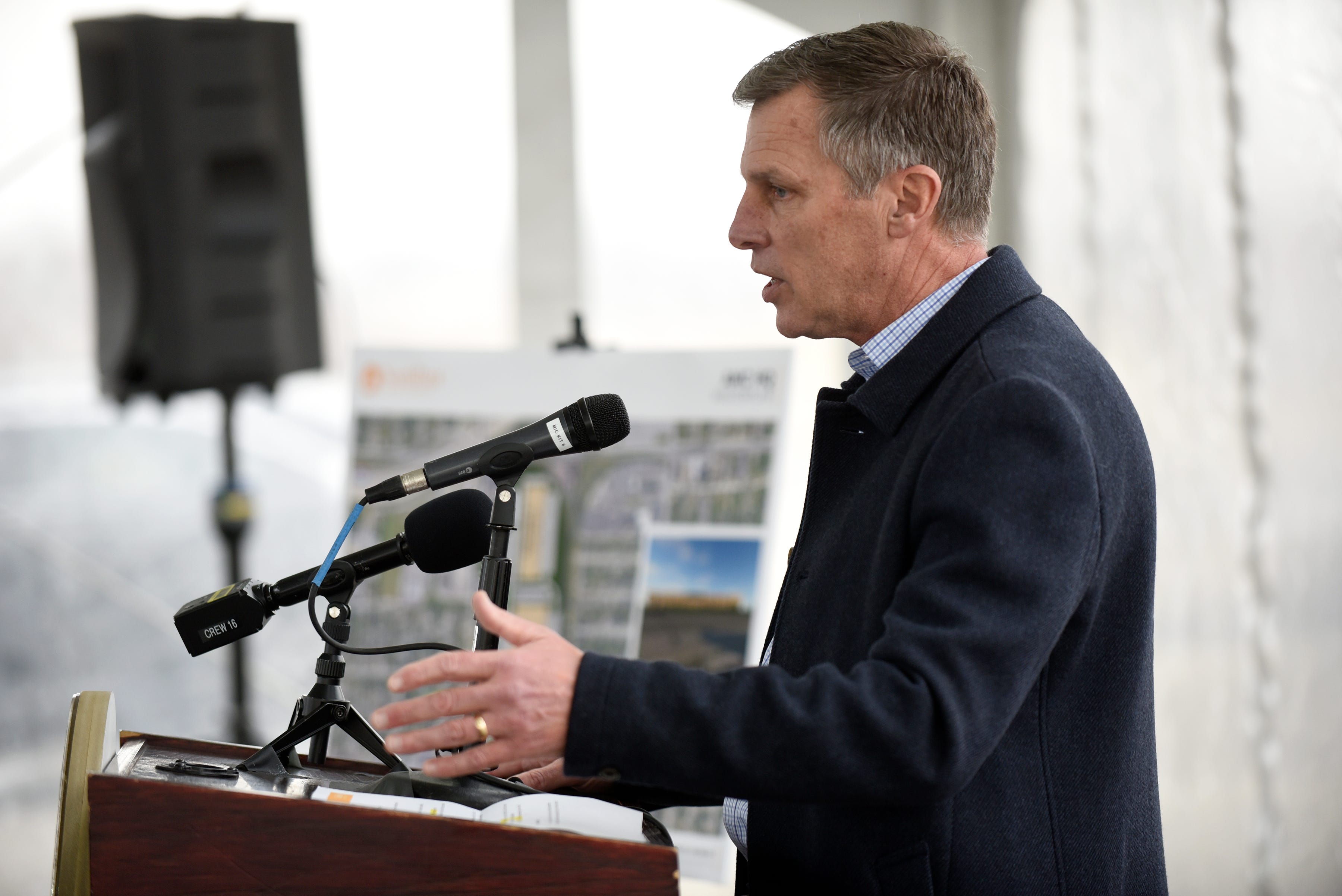 Tim Condor, vice president of acquisitions for NorthPoint Development, speaks during a press conference at the former headquarters of the American Motor Corporation in Detroit on Thursday, Dec. 9, 2021.