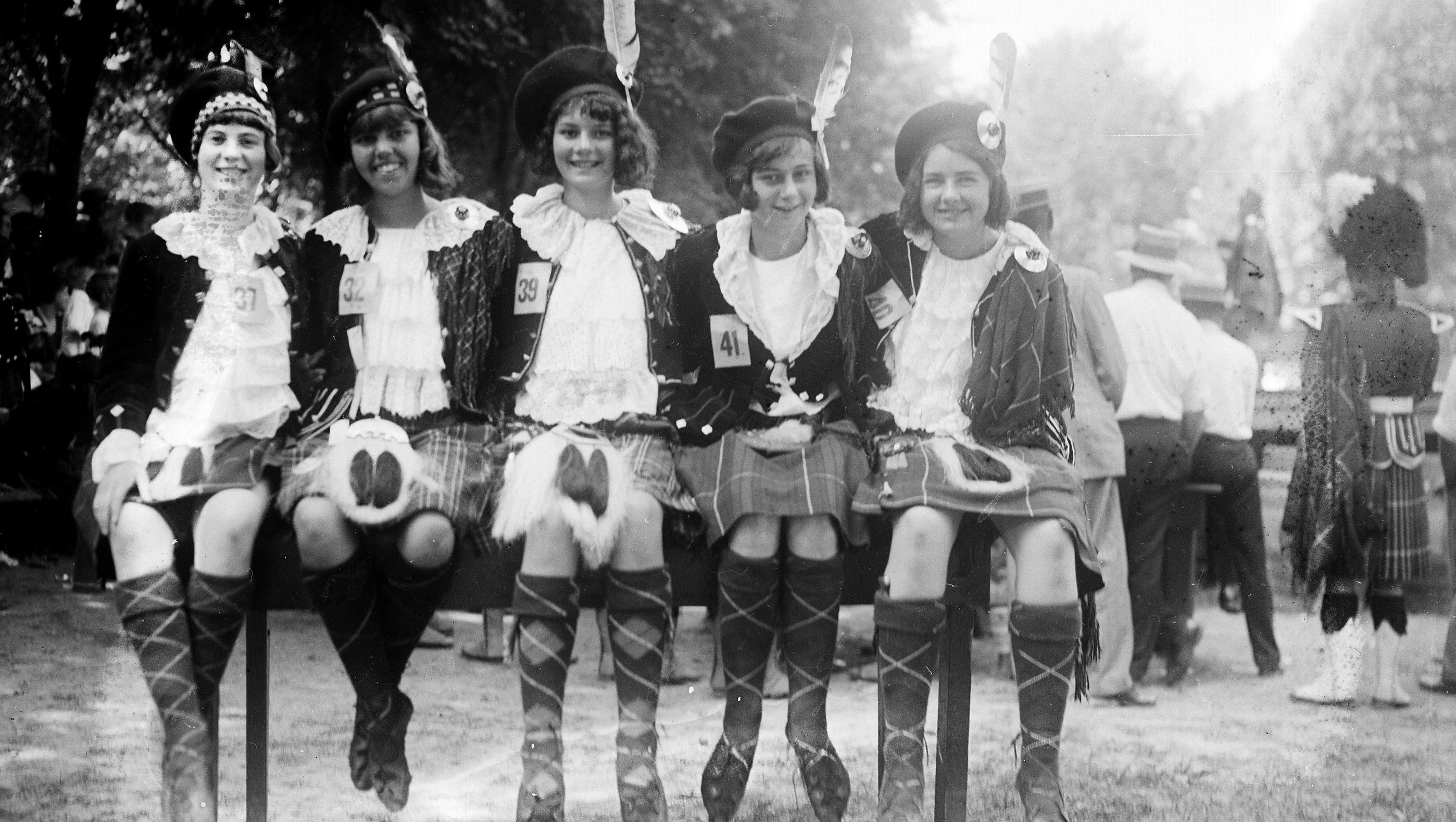 Some lasses in Scottish gear enjoy a St. Andrew's Society picnic on Boblo Island in the 1920s.