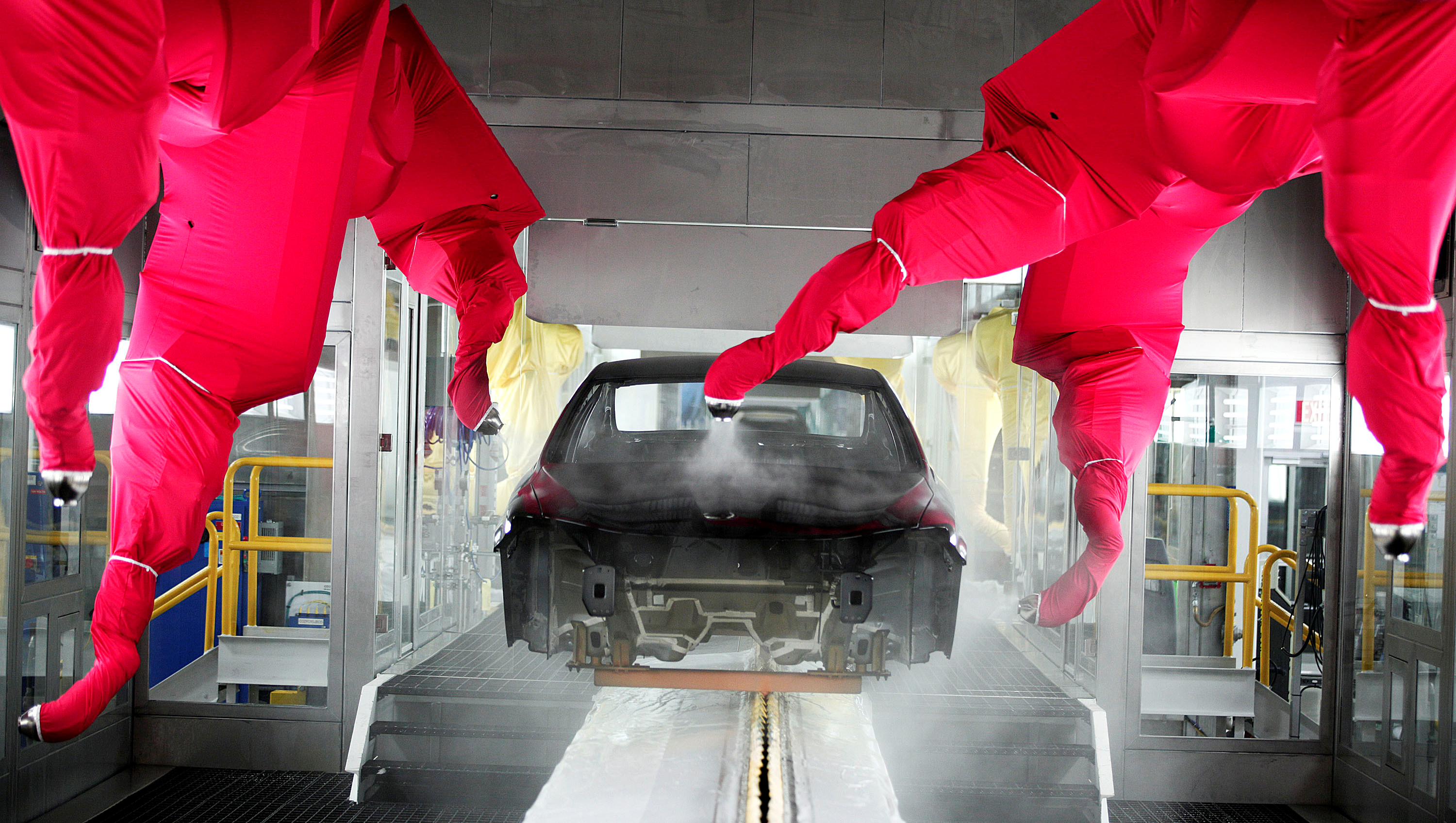 A 2015 Chrysler 200 undergoes base coat exterior painting at the Sterling Heights Assembly Plant March 14, 2014 in Sterling Heights, Michigan.