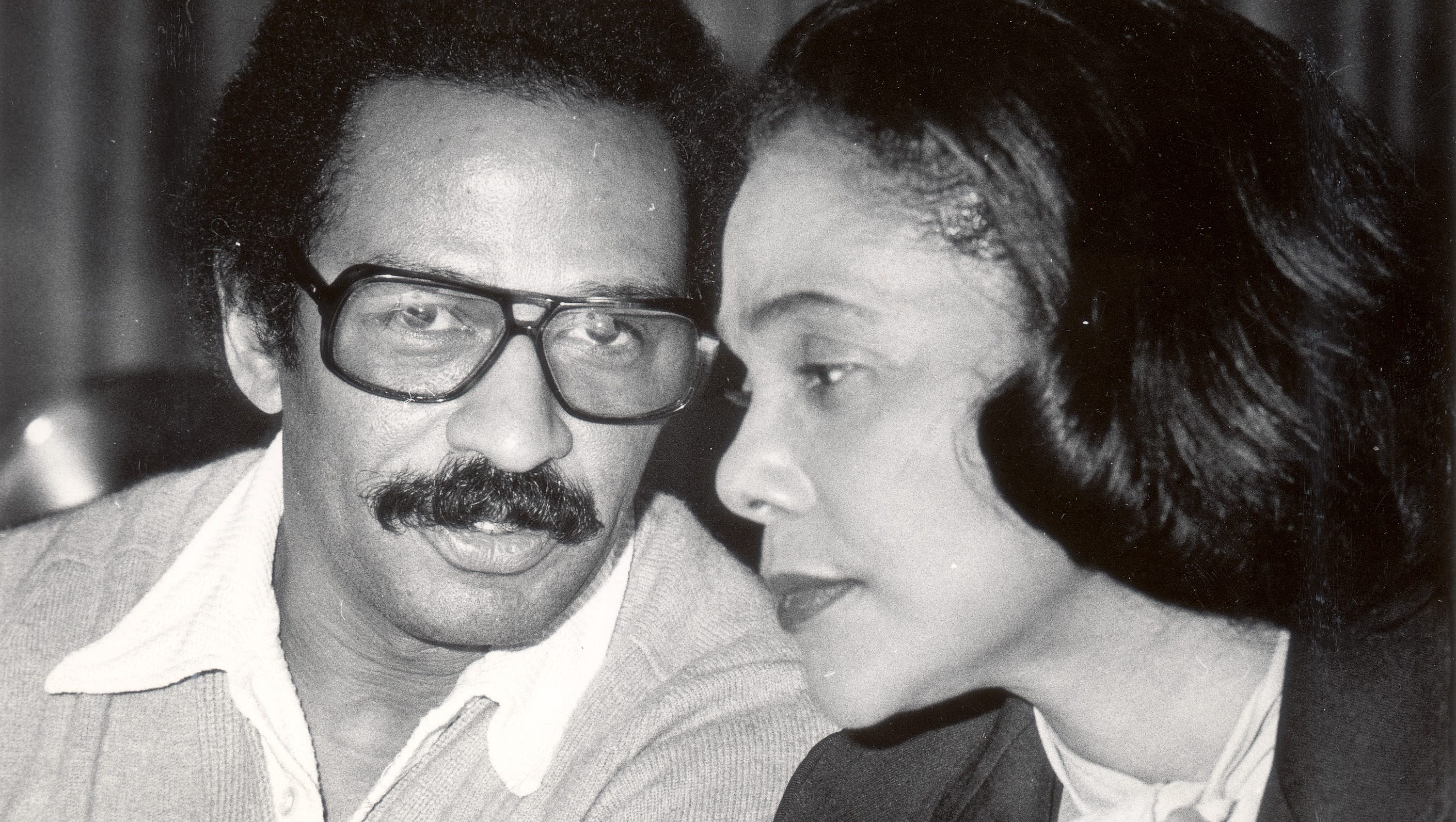 Conyers and Coretta Scott King chat during a 1978 United Auto Workers conference.