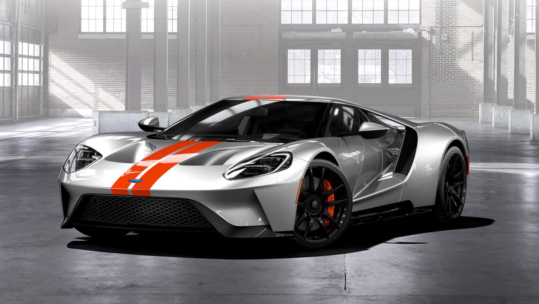 Ford has begun to take orders for its GT supercar, which will be priced in the mid-$400,000s.  Above: A GT in Ingot Silver, with a Competition Orange stripe.