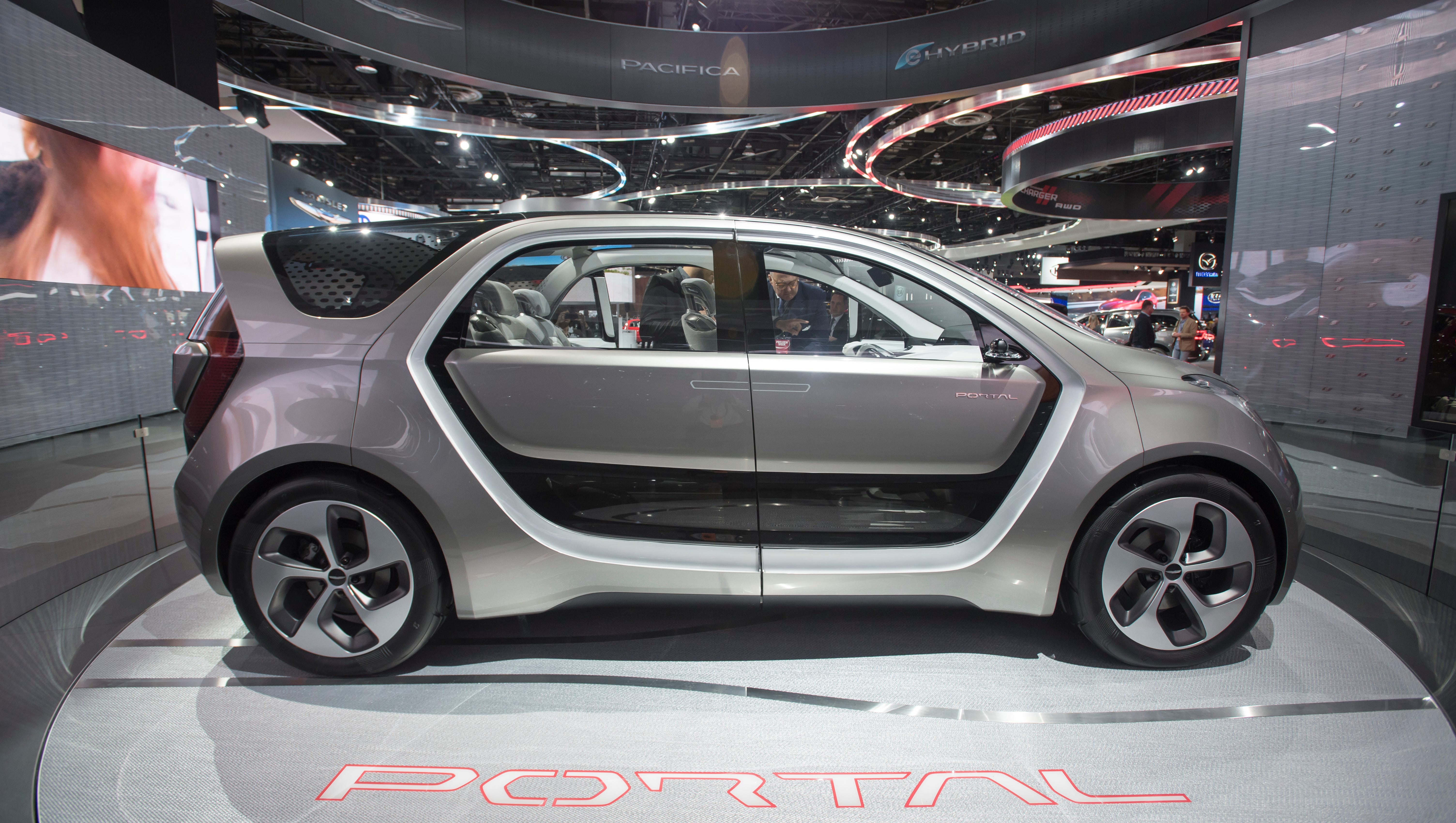 The Chrysler Portal concept has portal-shaped articulating front and rear doors.
