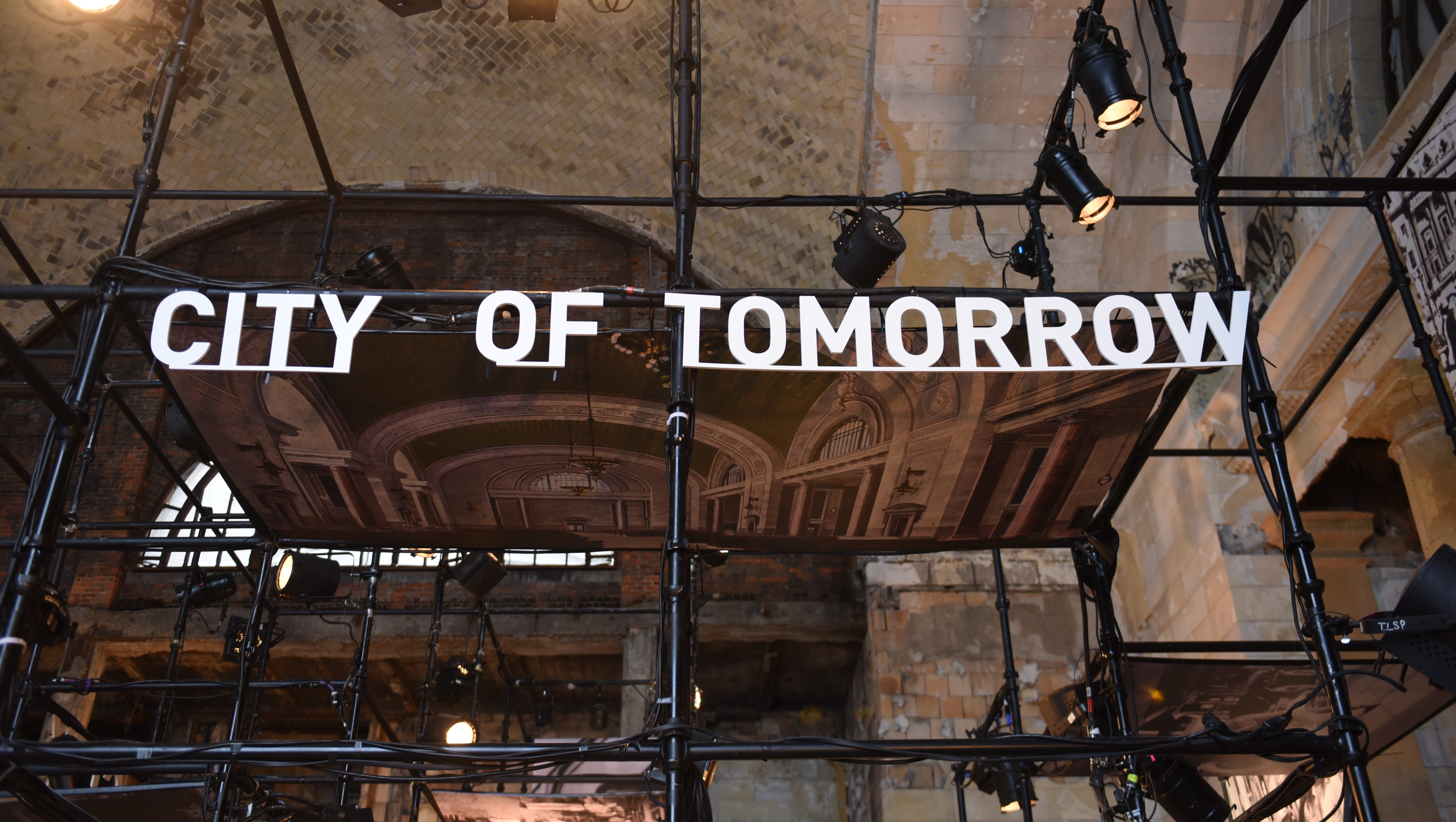 The tag City of Tomorrow is displayed in the grand hall of the Michigan Central Train Depot on Friday.