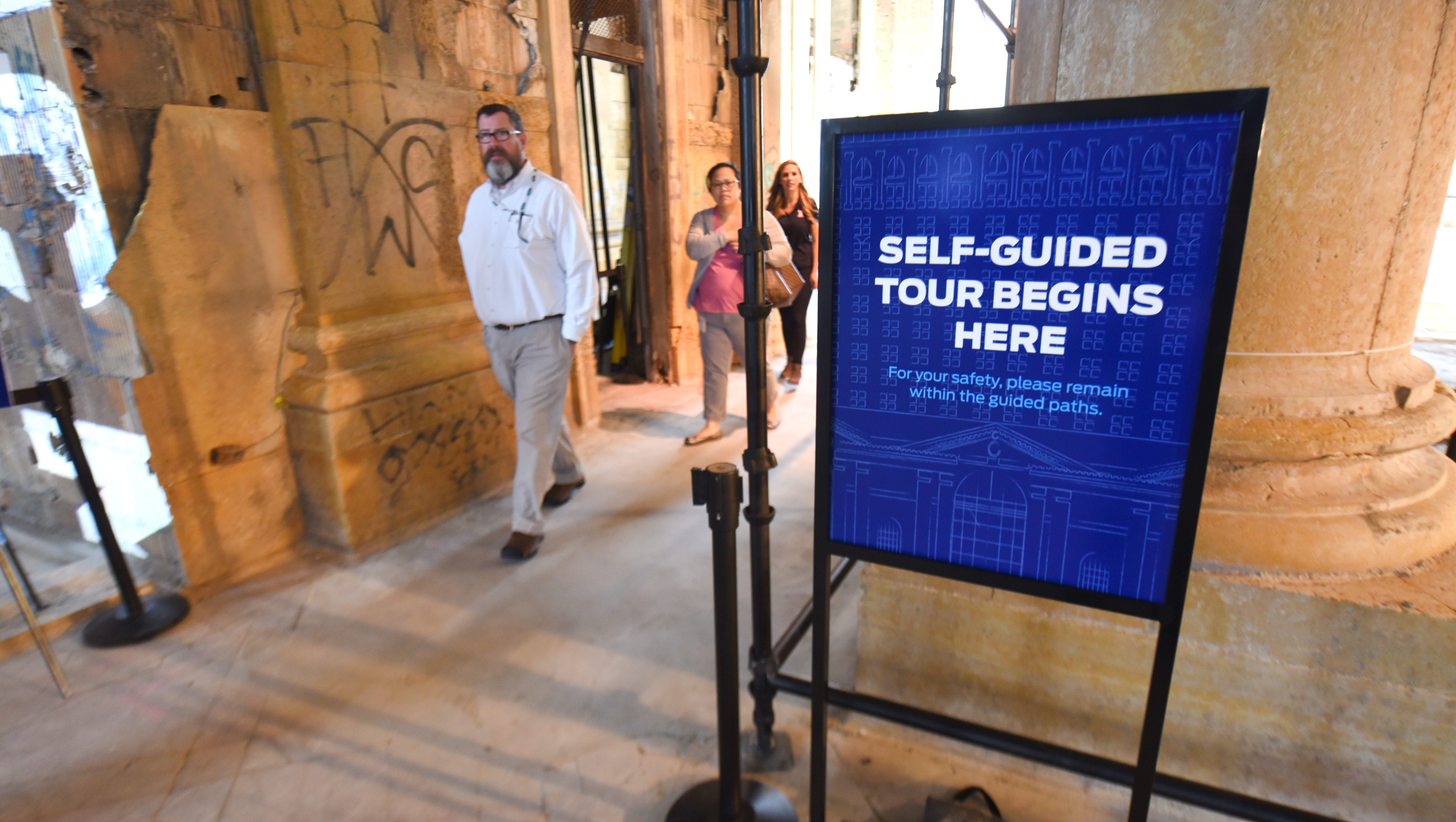 A sign marks the beginning of the self-guided tour at the Michigan Central Train Depot on Friday.