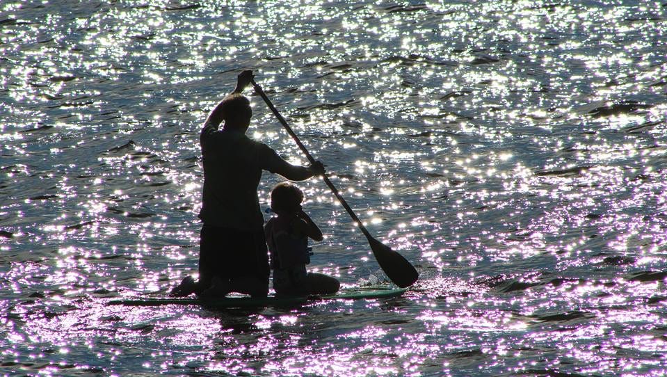 In "Paddling on Sunbeams," Amanda Knoll of Holland captured her husband Dan and daughter Izzabelle, 7, paddling into the sunset  on Lake Macatawa in Holland. "Since then my daughter can hardly stay off the board with her daddy! " she said.