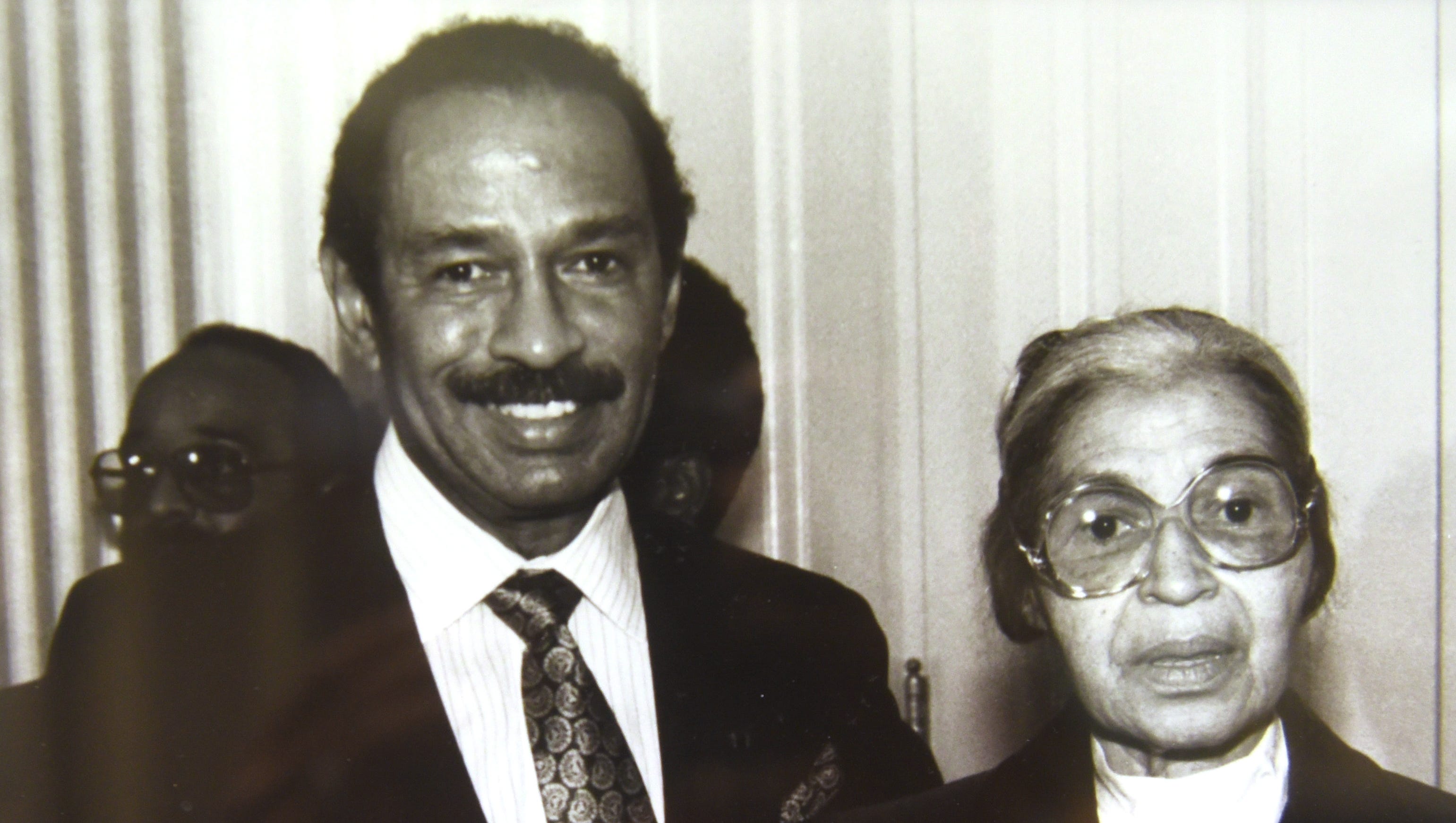 A framed photo of Conyers with one of his heroes, civil rights icon Rosa Parks, is displayed in Conyer's offices in the U.S. Federal Courthouse in Detroit in June 2017.