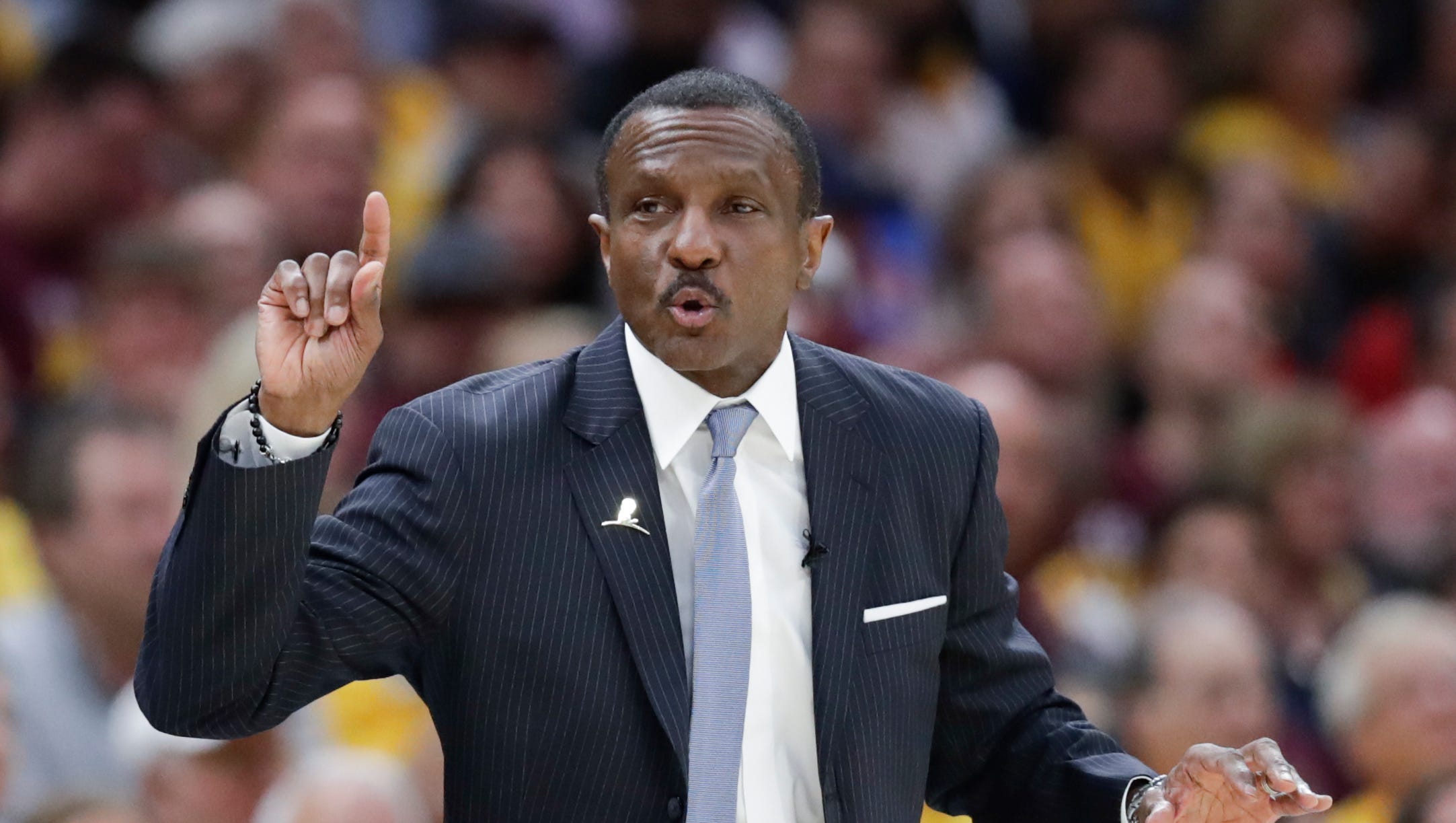 Toronto Raptors head coach Dwane Casey gestures against the Cleveland Cavaliers in the first half of Game 4 of an NBA basketball second-round playoff series, Monday, May 7, 2018, in Cleveland.