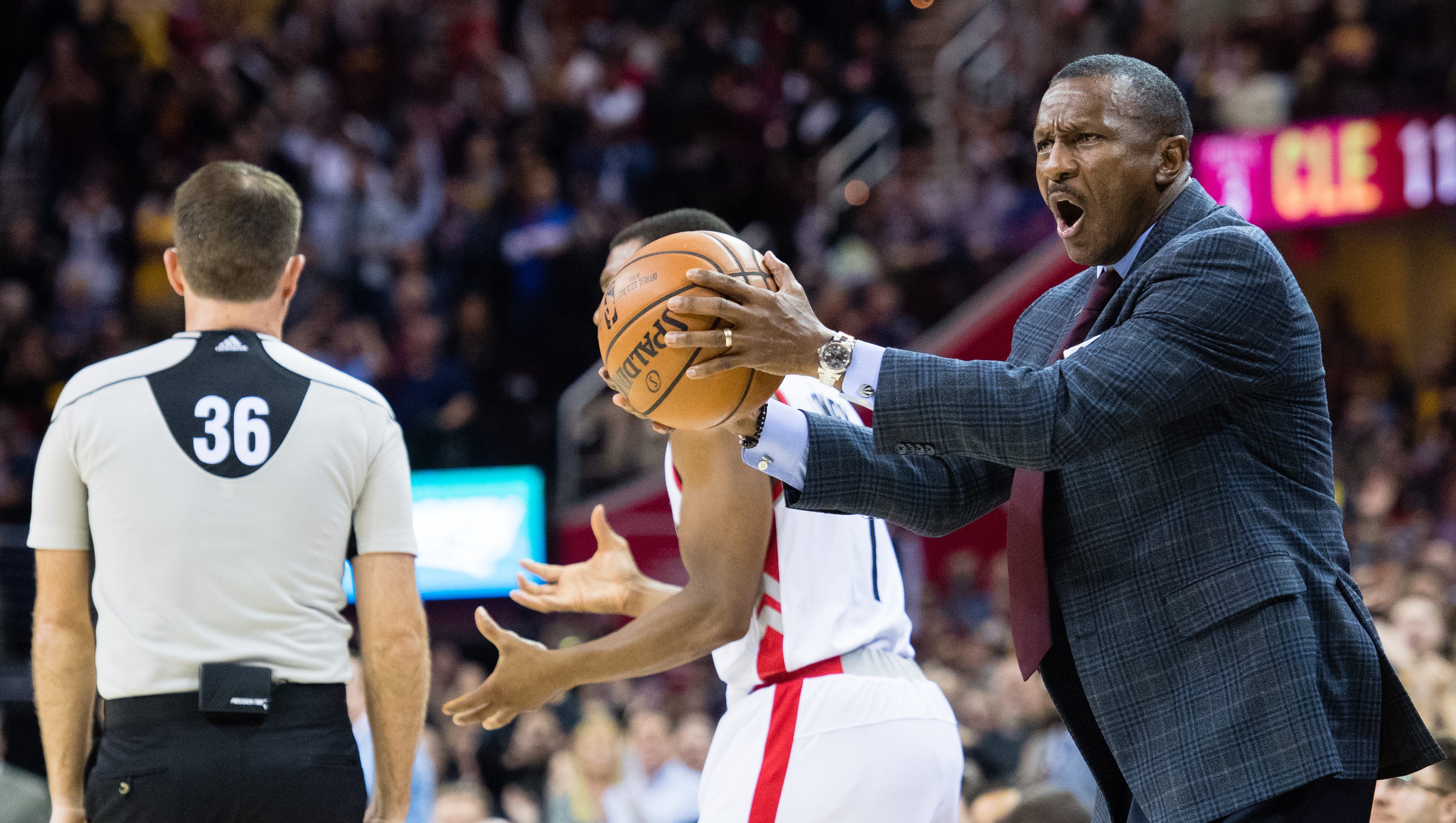 Dwane Casey of the Toronto Raptors reacts to a call during the second half against the Cleveland Cavaliers at Quicken Loans Arena on November 15, 2016 in Cleveland, Ohio.