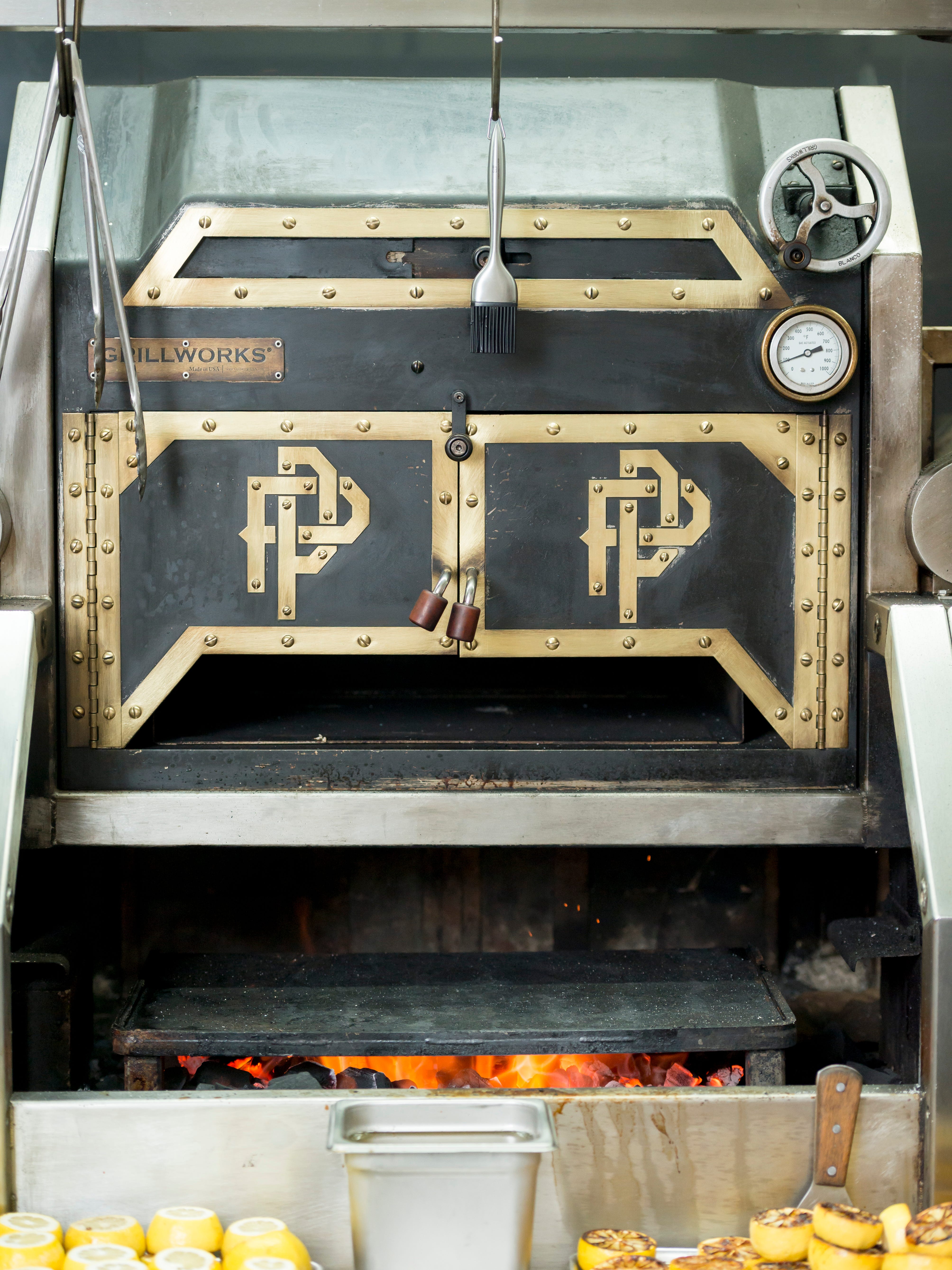 The custom wood fire grill made by Grillworks.