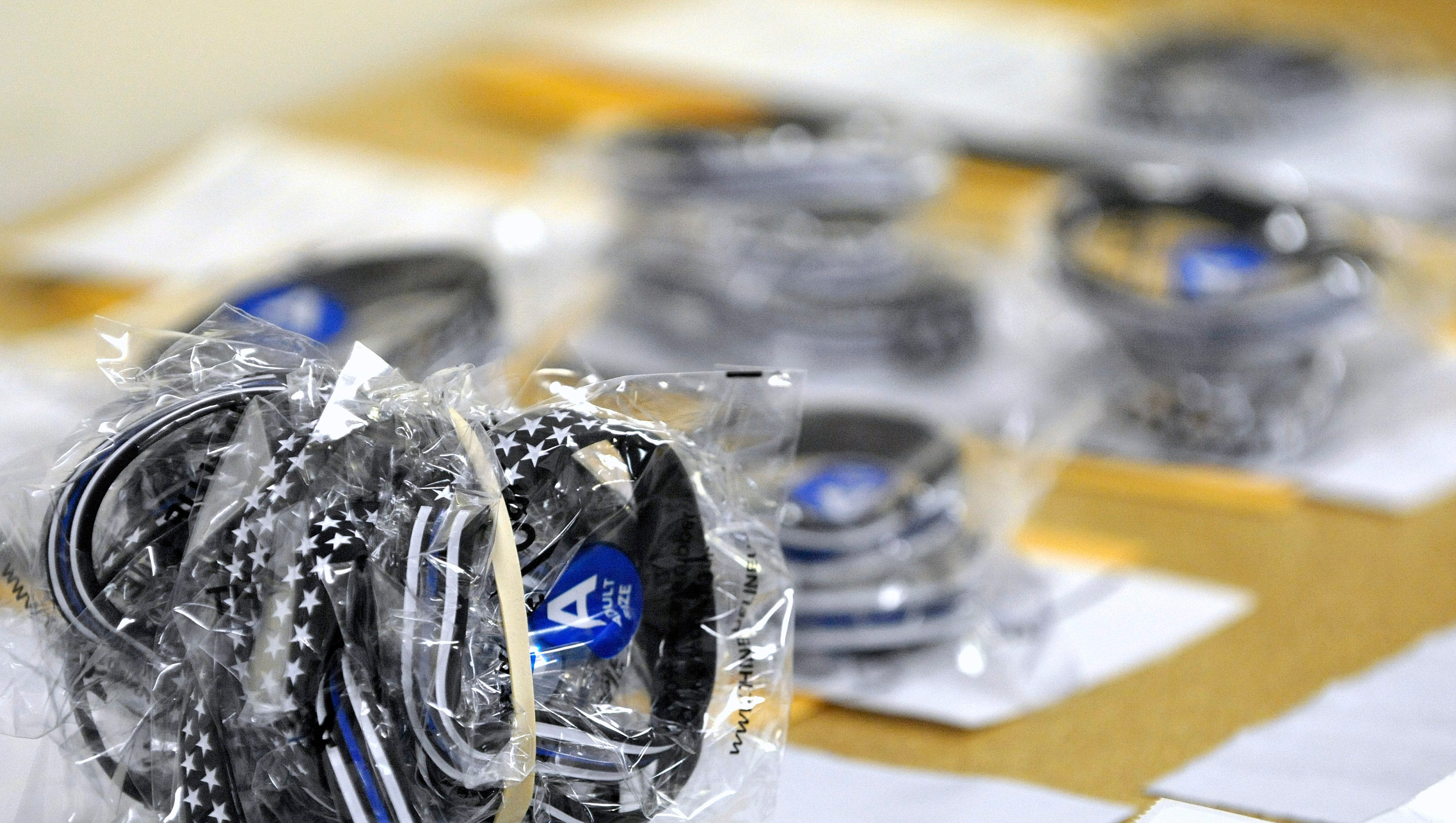 These TBL USA wrist bands, ready to be shipped throughout the U.S., are part of the Give Blue fundraising branch of the company. When a law enforcement officer is killed in the line of duty, the TBL USA donates 100% of the profits from wrist band fundraisers to the families of those fallen officers.