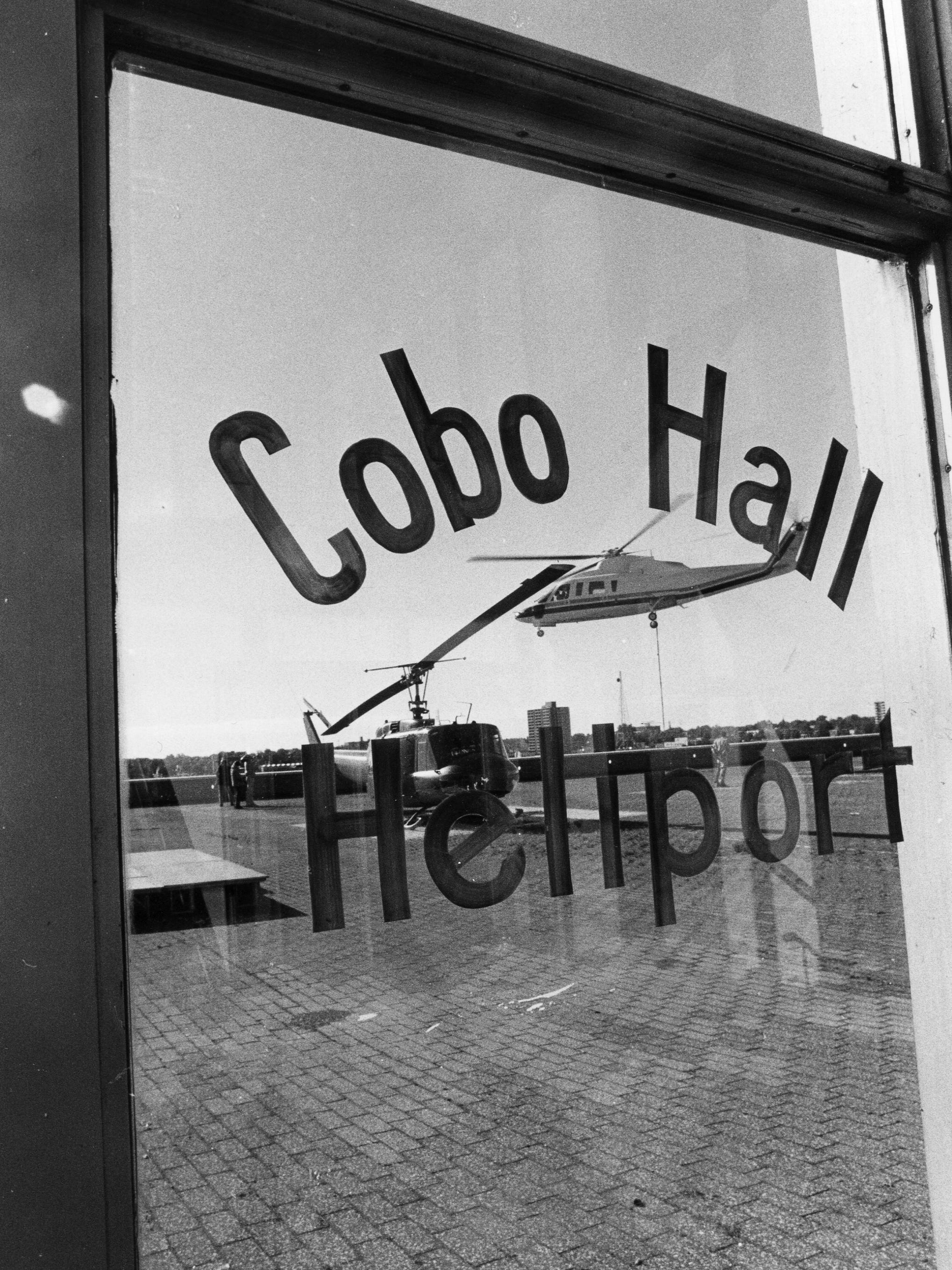 Helicopters take off at the Cobo Hall heliport on Oct. 13, 1988.