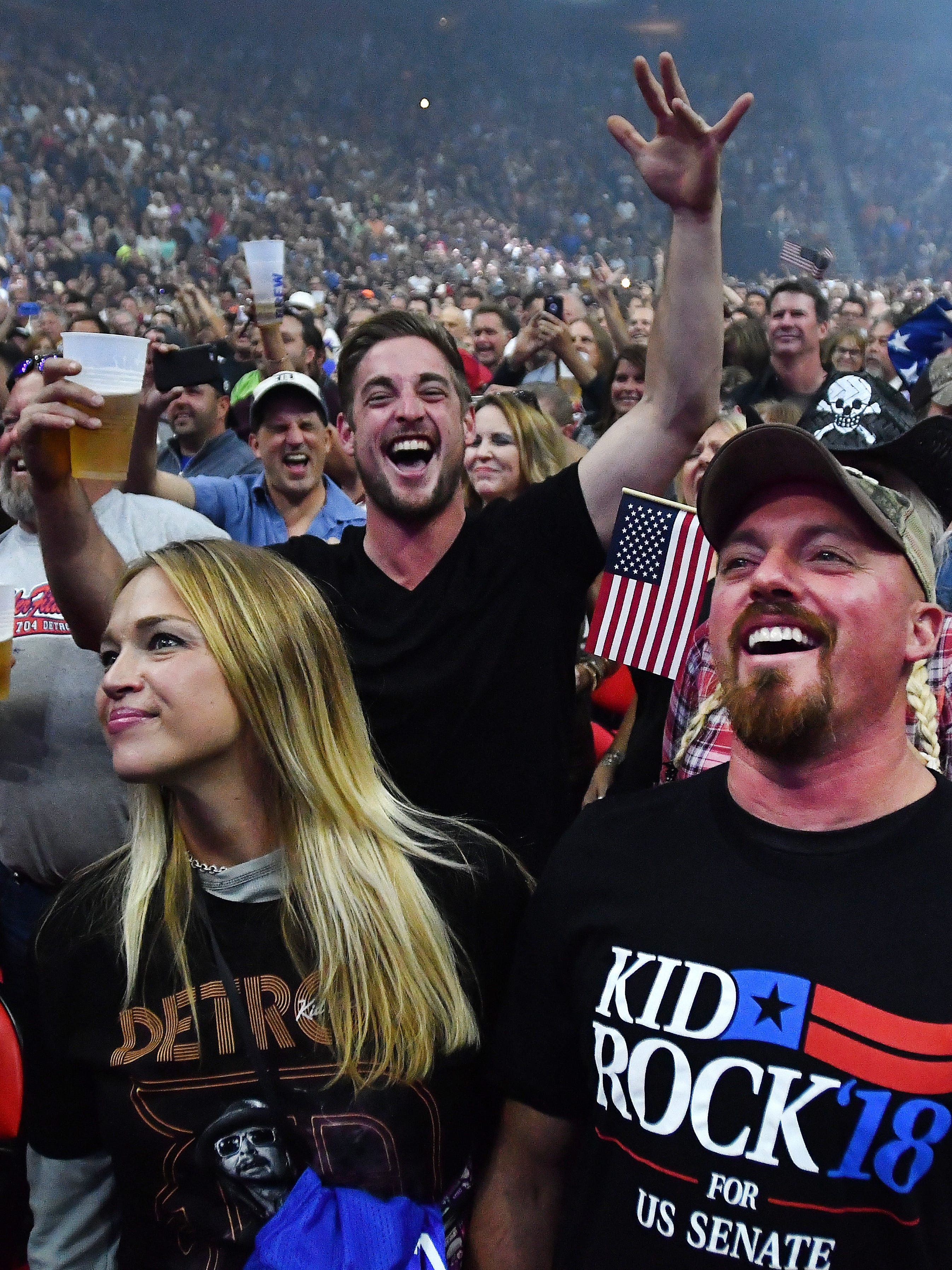 Kid Rock fans cheer their hero during the first of several concerts to open the new arena.