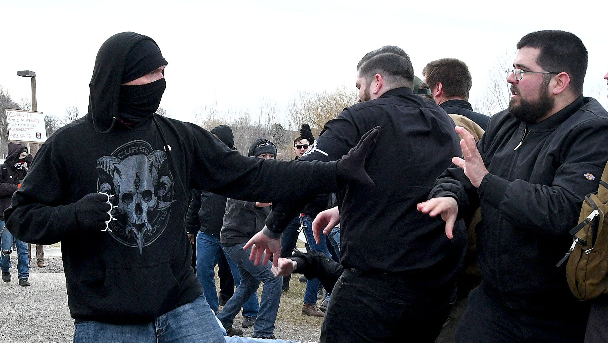 An ANTIFA sympathizer  attacks white nationalist Matthew Heimbach with a spiked "knuckle duster" as Heimbach attempts to enter the MSU Pavilion for Richard Spencer's speech.