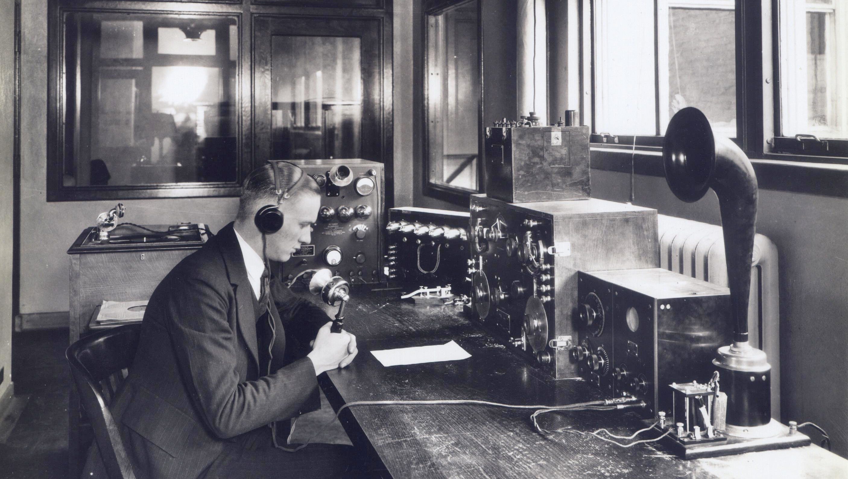 The radio station known for nearly a century now as WWJ began as a birthday gift from Detroit News Publisher W.E. Scripps to his son, W.J. "Bill" Scripps, who had asked for a radio set with which he could experiment.  Above, Fred Lathrop mans the operator's desk circa 1922.