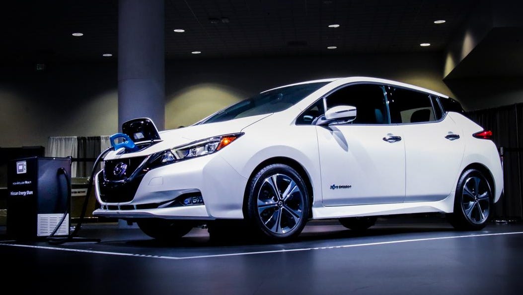 Electric cars, like the Nissan LEAF (2019 model shown), have outsold fossil fuel-powered cars in Norway last month.