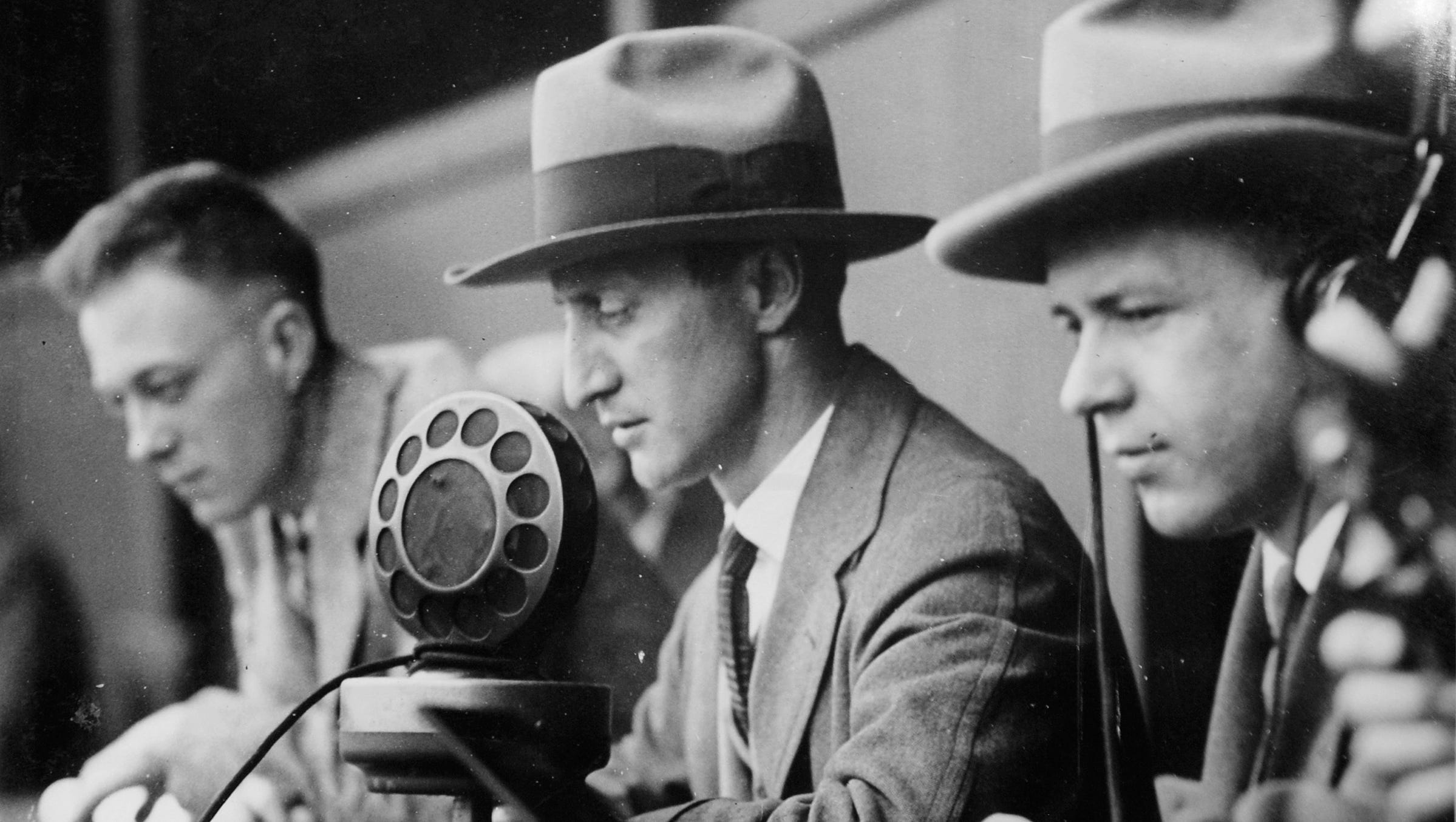 This scene is from the first broadcast of a Detroit Tigers baseball game at Navin Field, on April 19, 1927.  From left are Harold Priestley, E. L. "Ty"  Tyson and Herbert Tank.