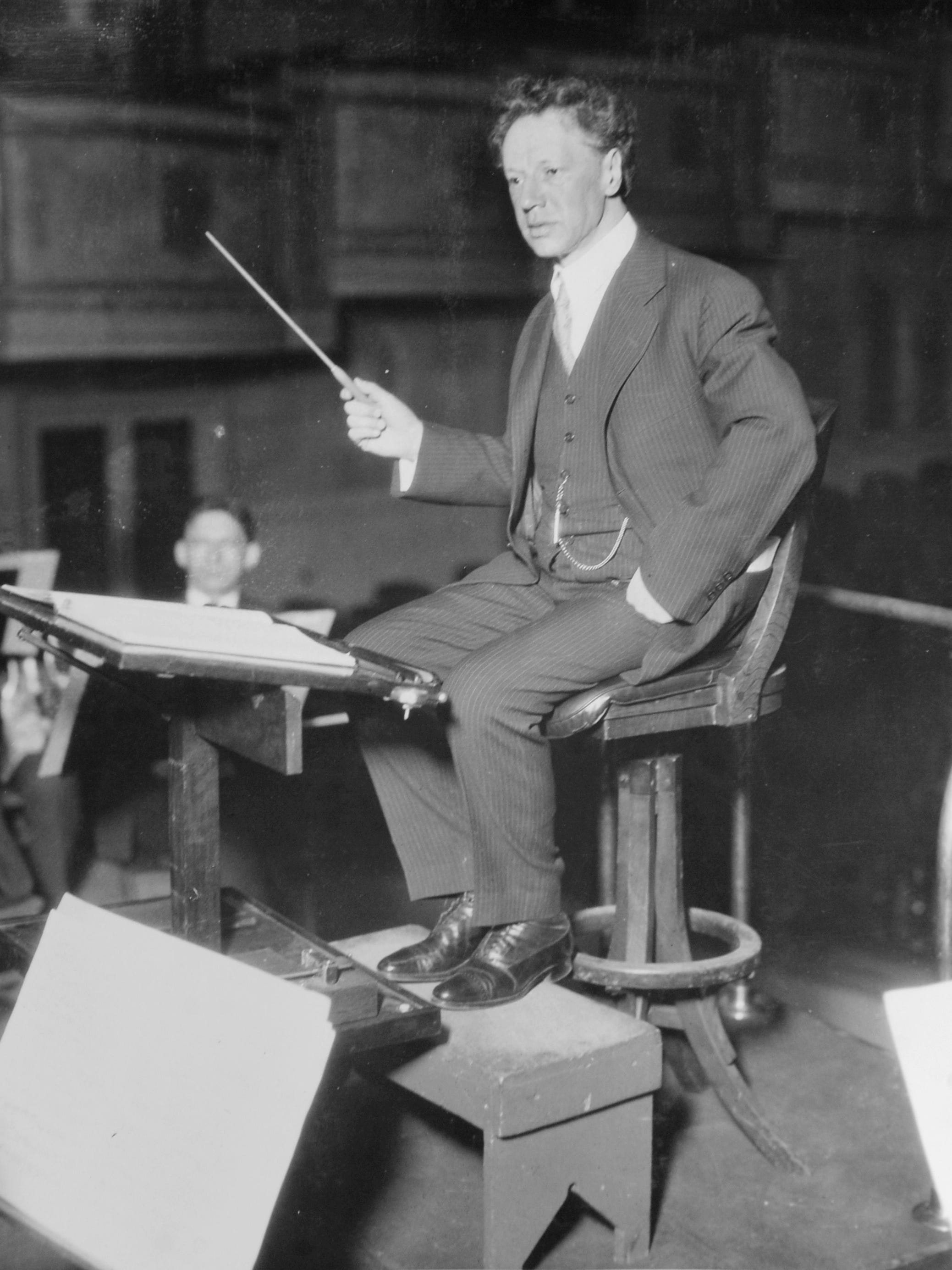 Ossip Gabrilowitsch, the founding director of the Detroit Symphony Orchestra, rehearses for the first broadcast of a symphony orchestra on the radio for WWJ in 1922.  The broadcast was the first "commercial" on WWJ and was sponsored by the Detroit Bank.