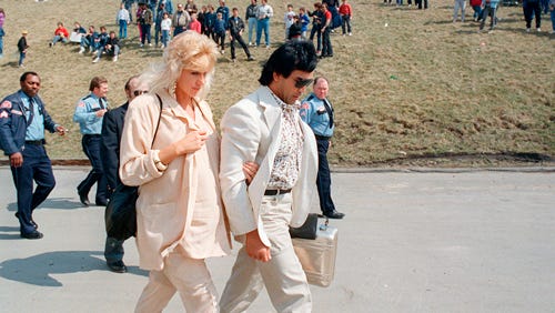 Ricky "The Dragon" Steamboat and his wife, Bonnie, arrive at the Silverdome for the big day.