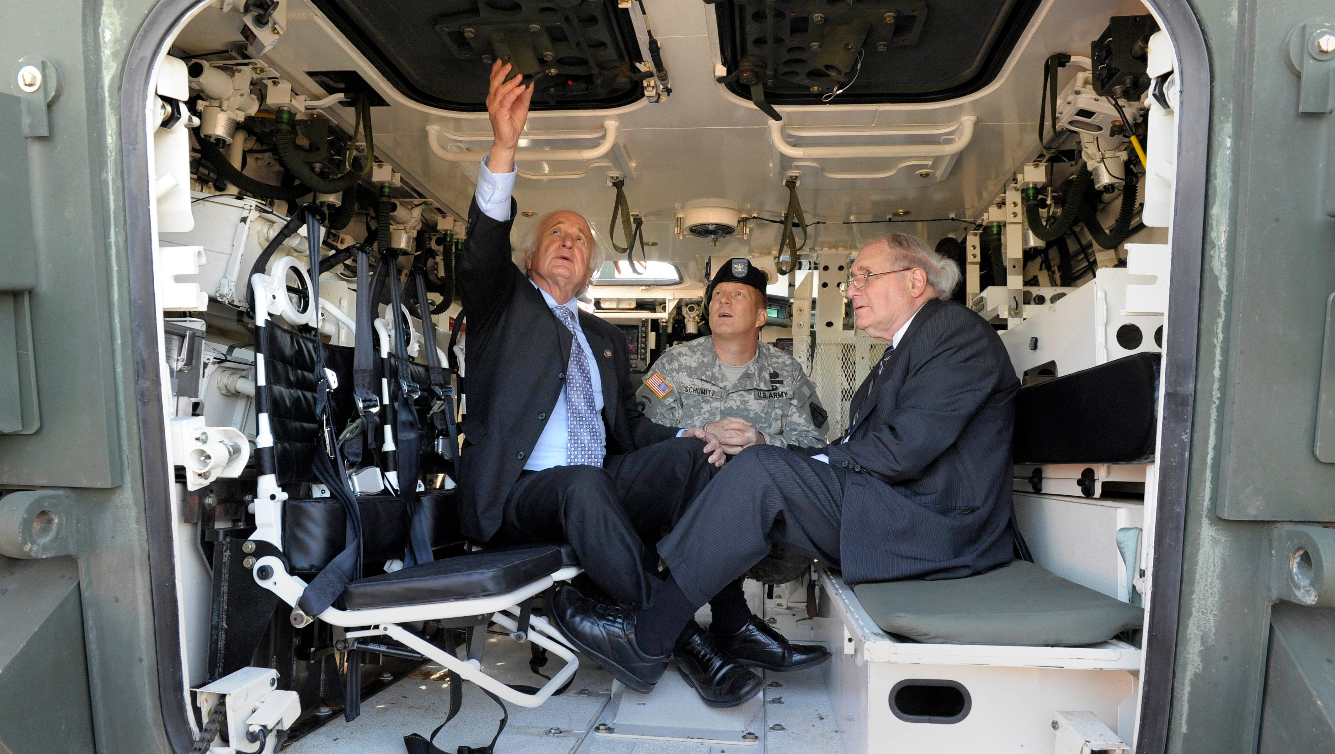 From left, Rep.  Sander Levin, Col. Bob Schumitz and Sen. Carl Levin inside a Stryker Troop carrier at the U.S. Army TACOM  groundbreaking ceremony in Warren, May 18, 2009.