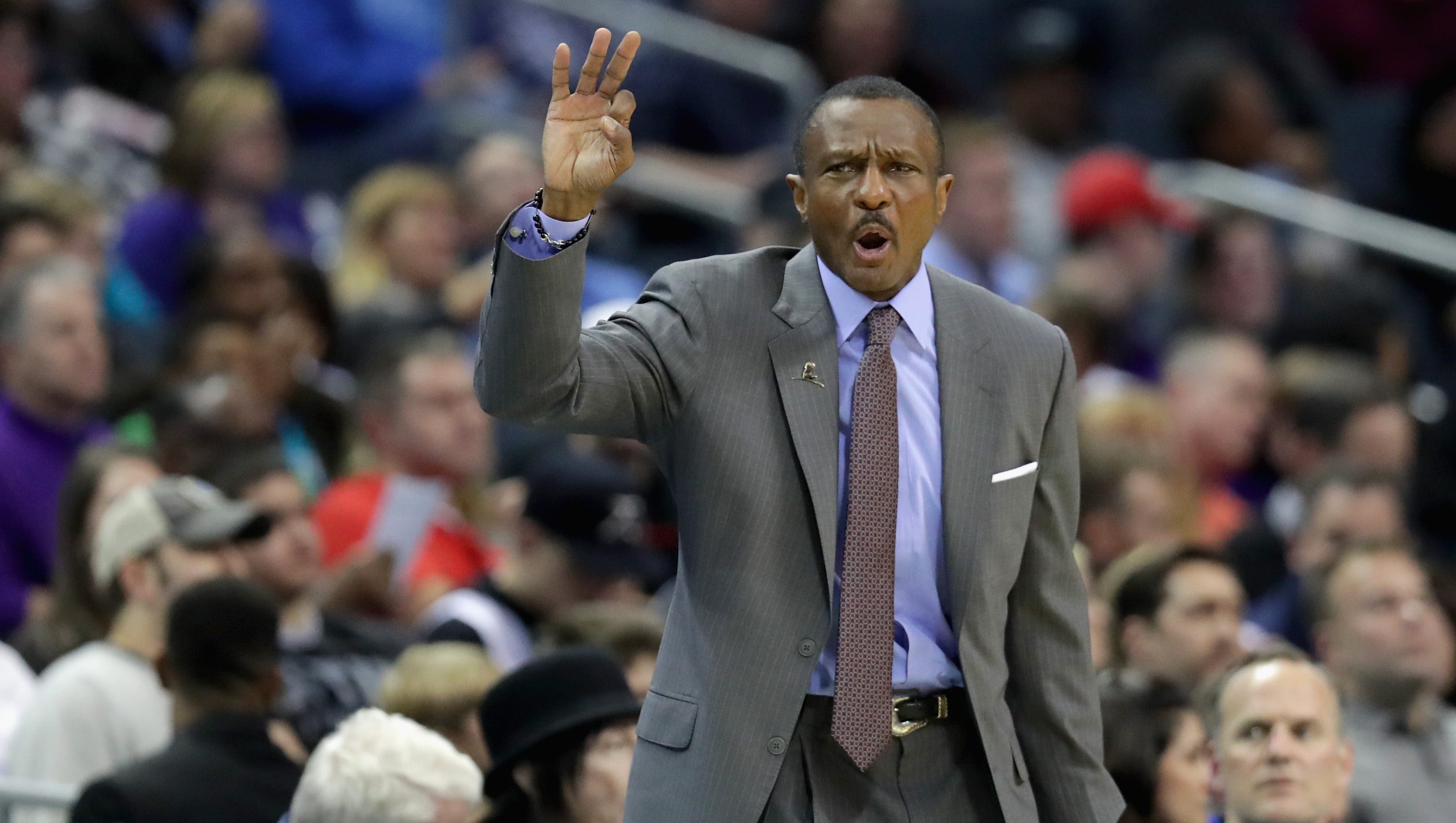 Dwane Casey of the Toronto Raptors yells to his team during their game against the Charlotte Hornets at Spectrum Center on January 20, 2017 in Charlotte, North Carolina.
