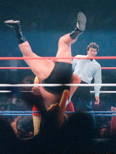 Andre the Giant gets slammed by Hulk Hogan. It was billed as the first time Andre had ever been lifted off his feet, but in reality, he had been slammed many times.