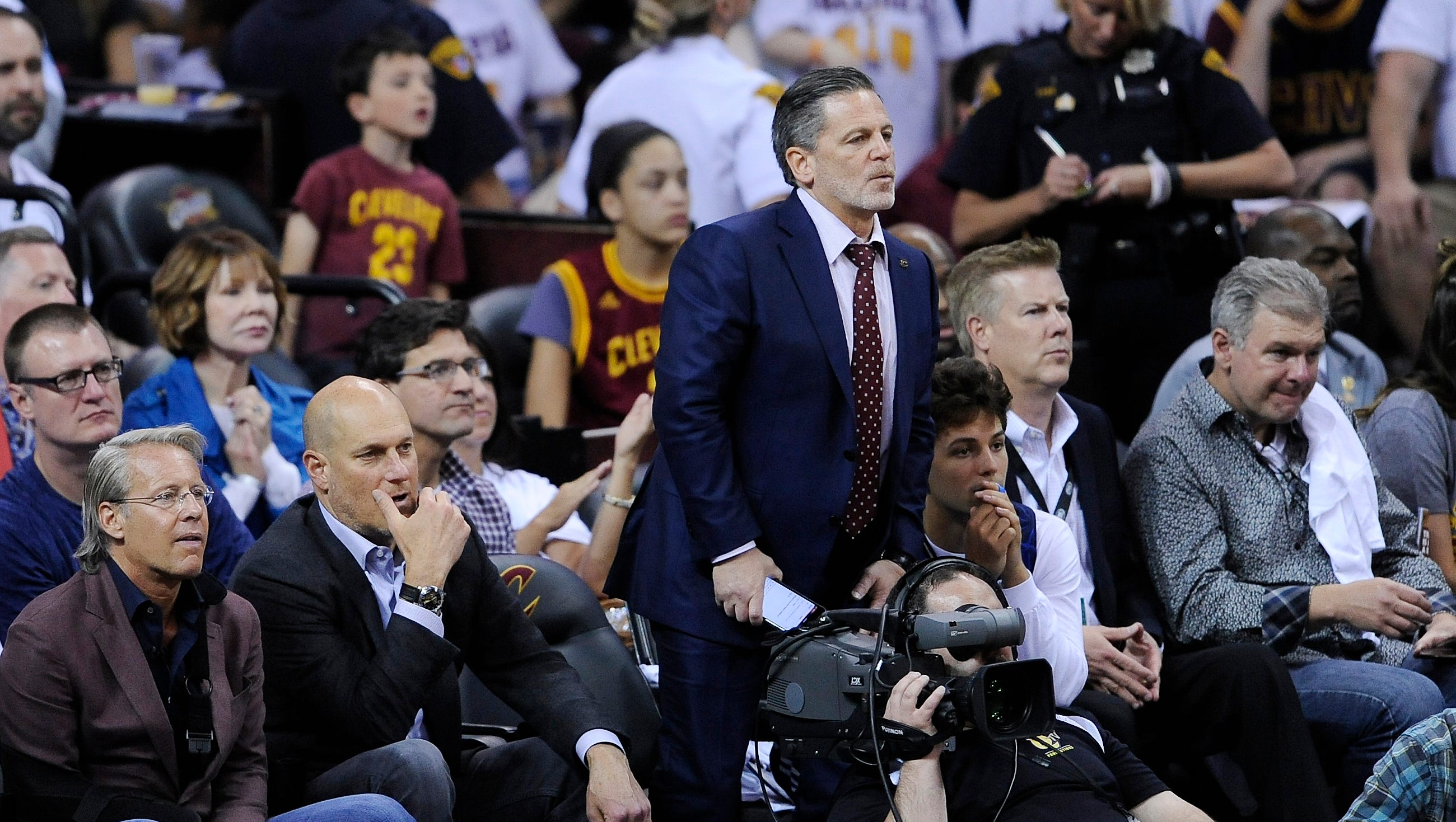 Cavaliers owner Dan Gilbert stands to watch his team in the fourth quarter.