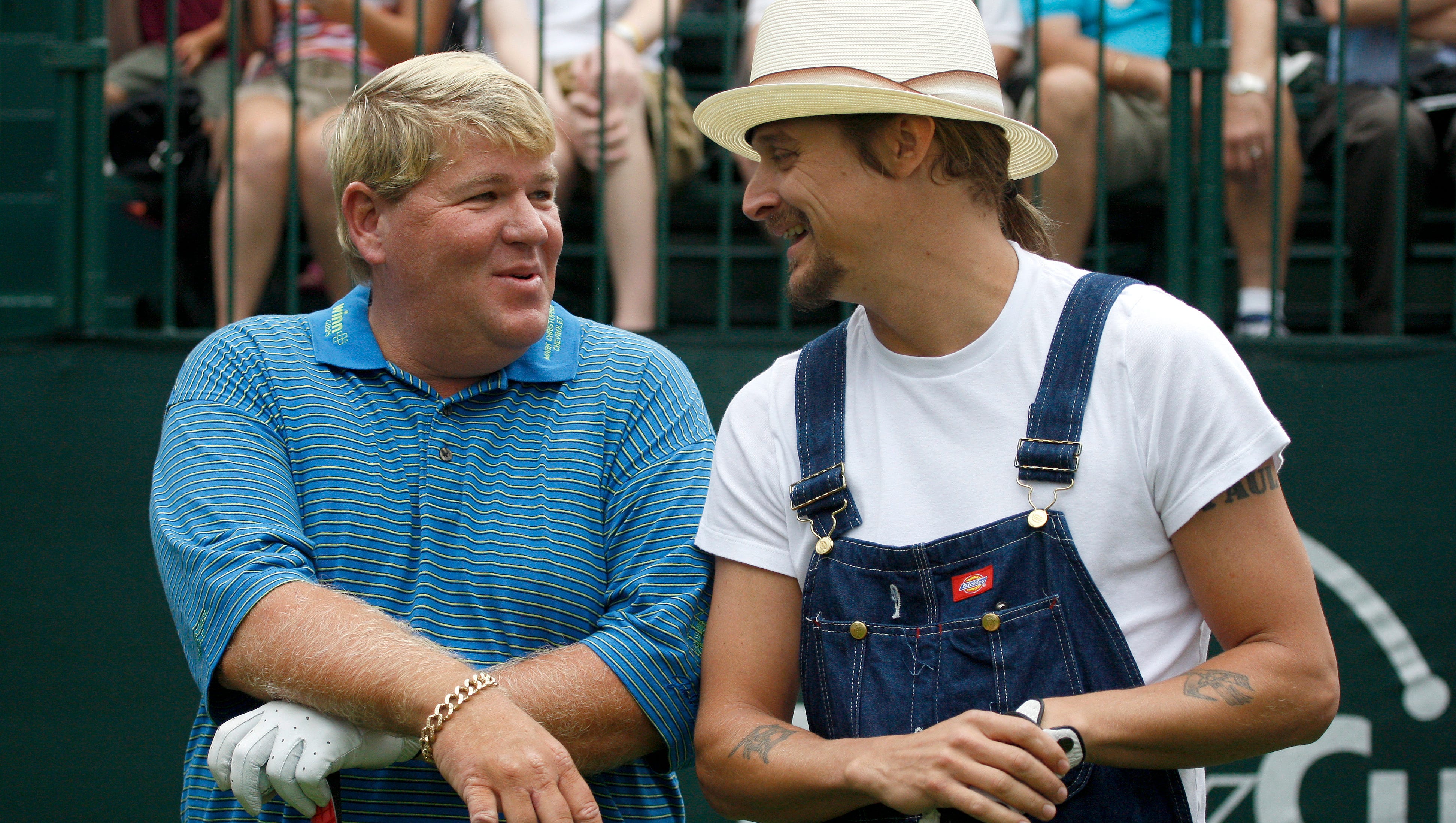 Golfer John Daly, left, and Kid Rock chat before teeing off at the 2008 Buick Open pro-am.