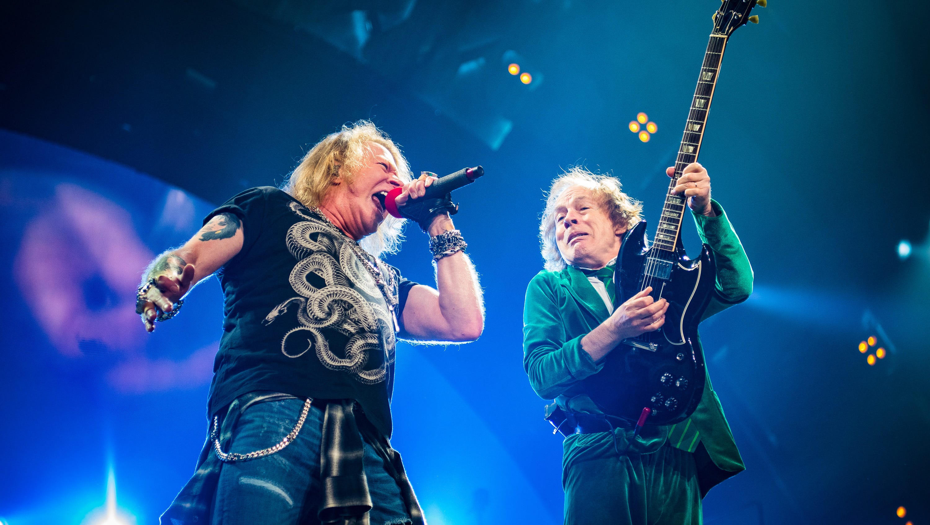 AC/DC, fronted by Axl Rose, left, with guitarist  Angus Young, performs Friday Sept. 9. 2016 during the “Rock or Bust” World Tour at The Palace Of Auburn Hills.