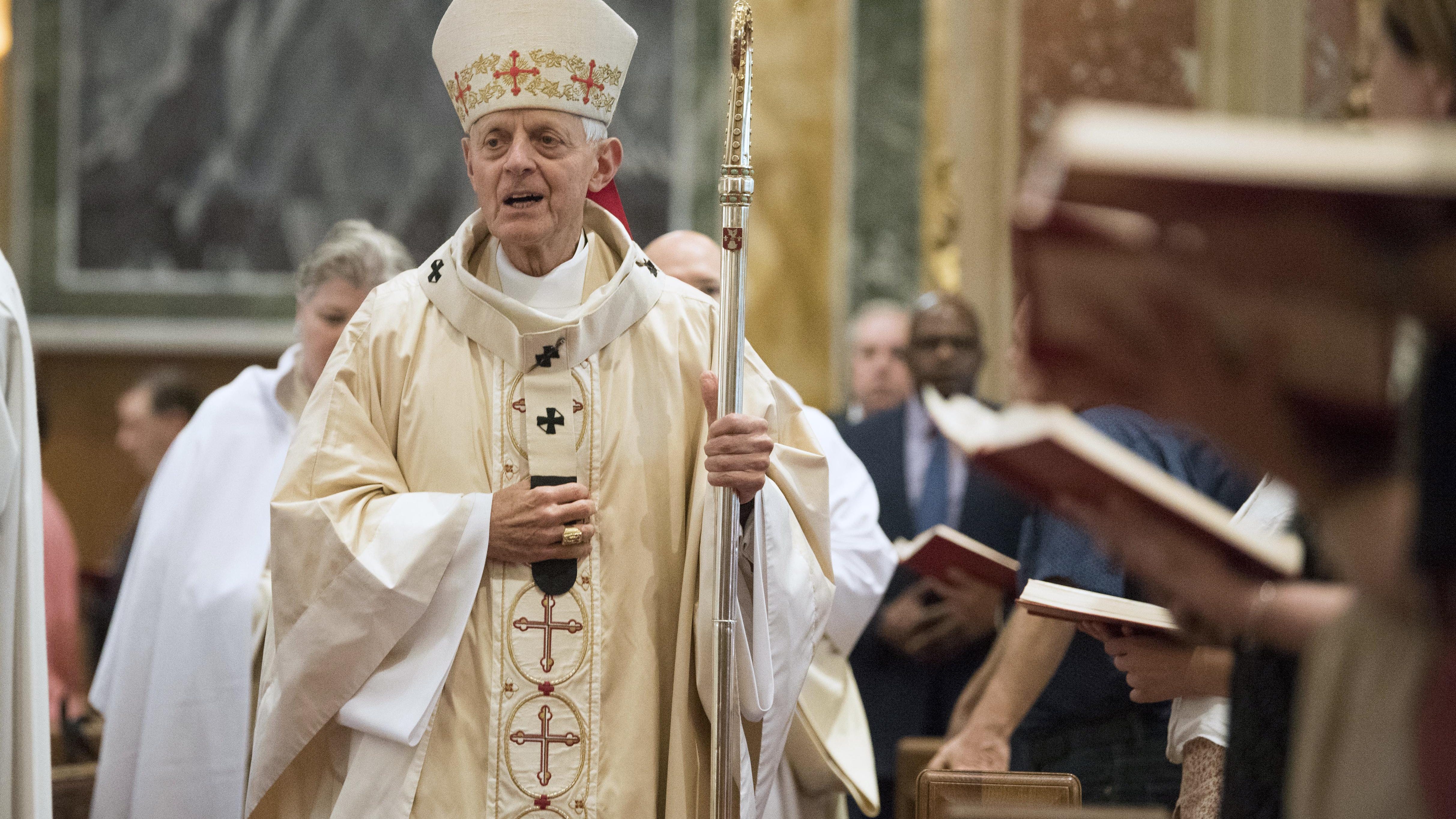 Cardinal Donald Wuerl, Archbishop of Washington, enters church for Mass at St. Mathews Cathedral, Aug. 15, 2018 in Washington.