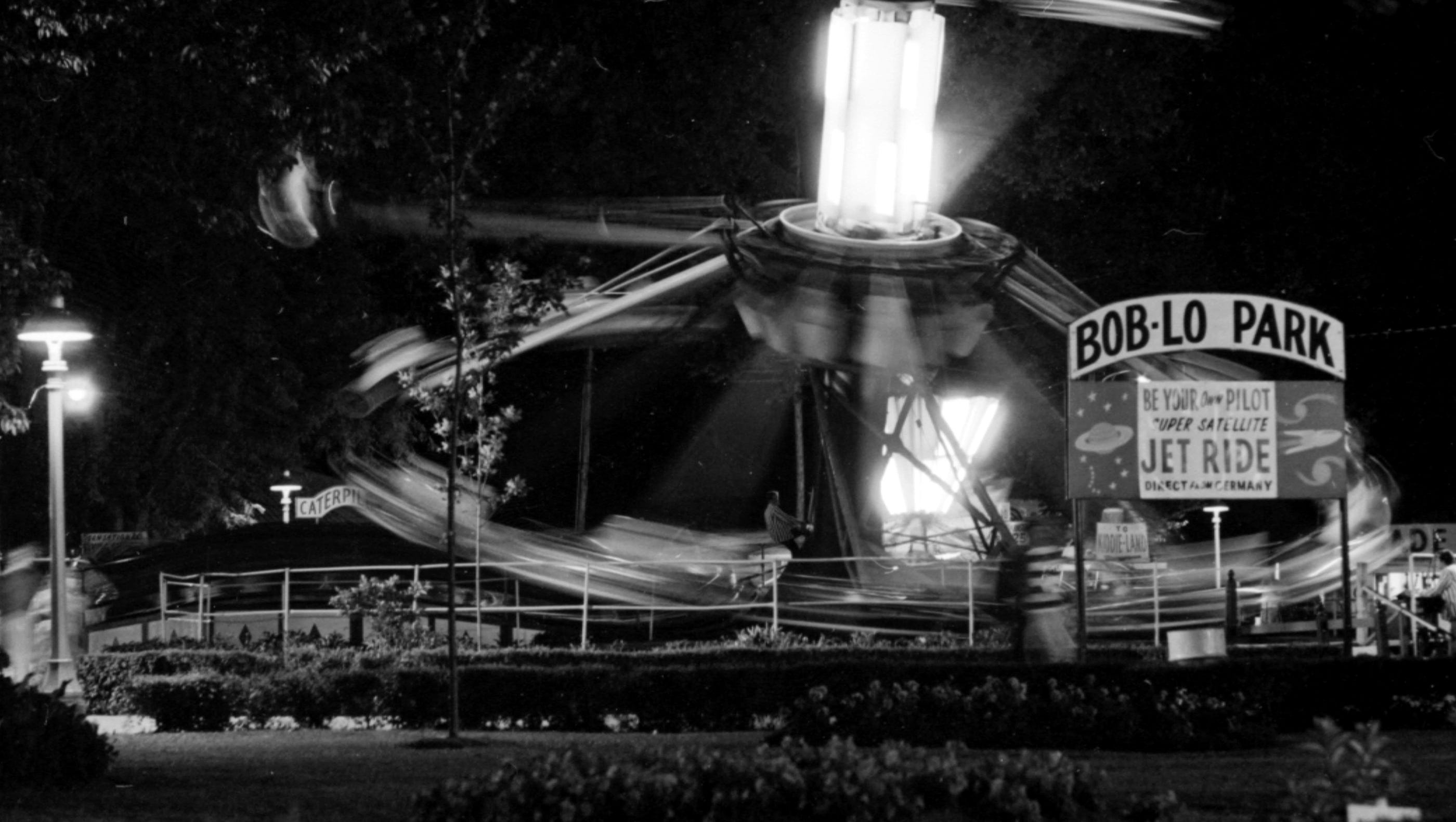 The rides are lit up at night on Boblo Island's amusement park in 1966.