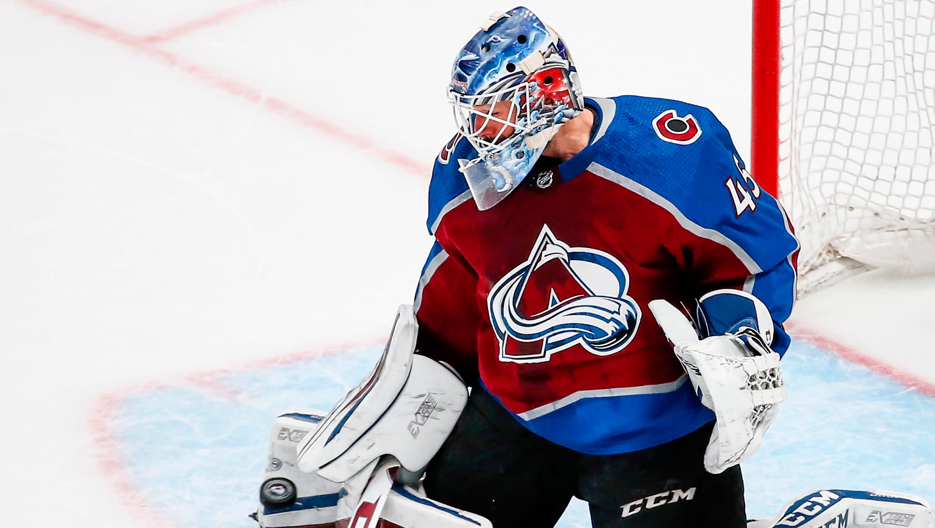 Colorado Avalanche goaltender Jonathan Bernier blocks a shot from the St. Louis Blues during the first period of a game Saturday, April 7, 2018, in Denver.