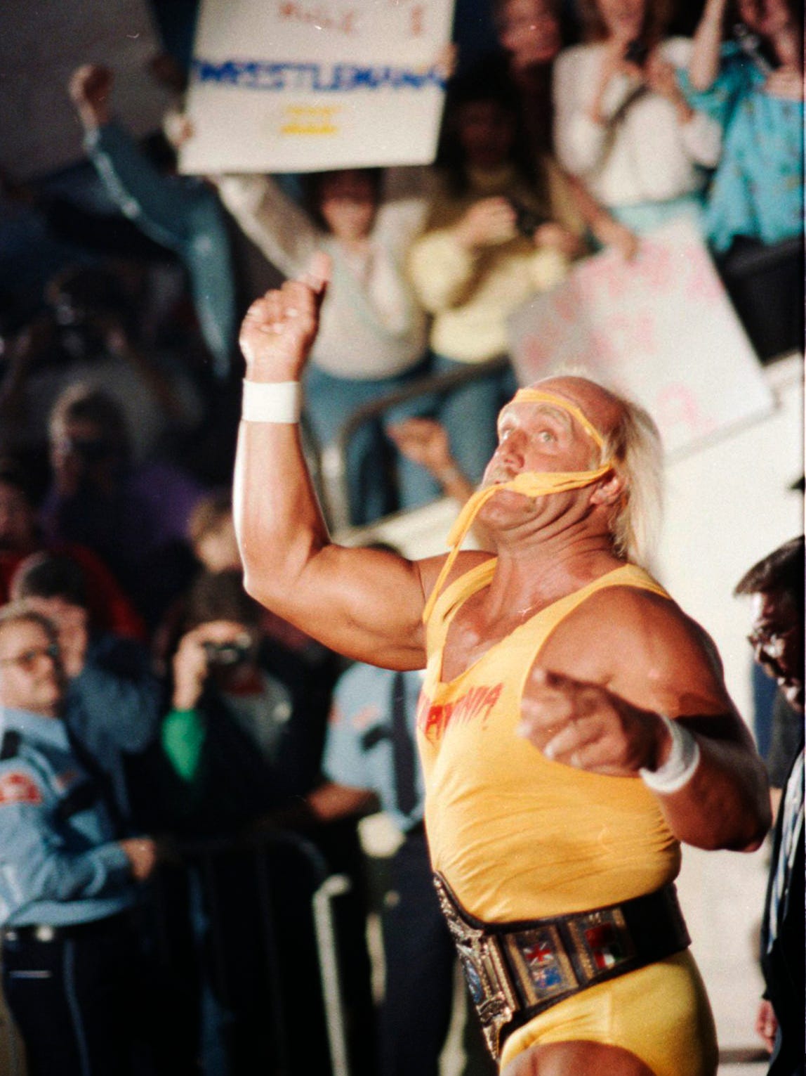 Hulk Hogan makes his way down the aisle at WrestleMania III, for his heavyweight-championship bout with Andre the Giant.