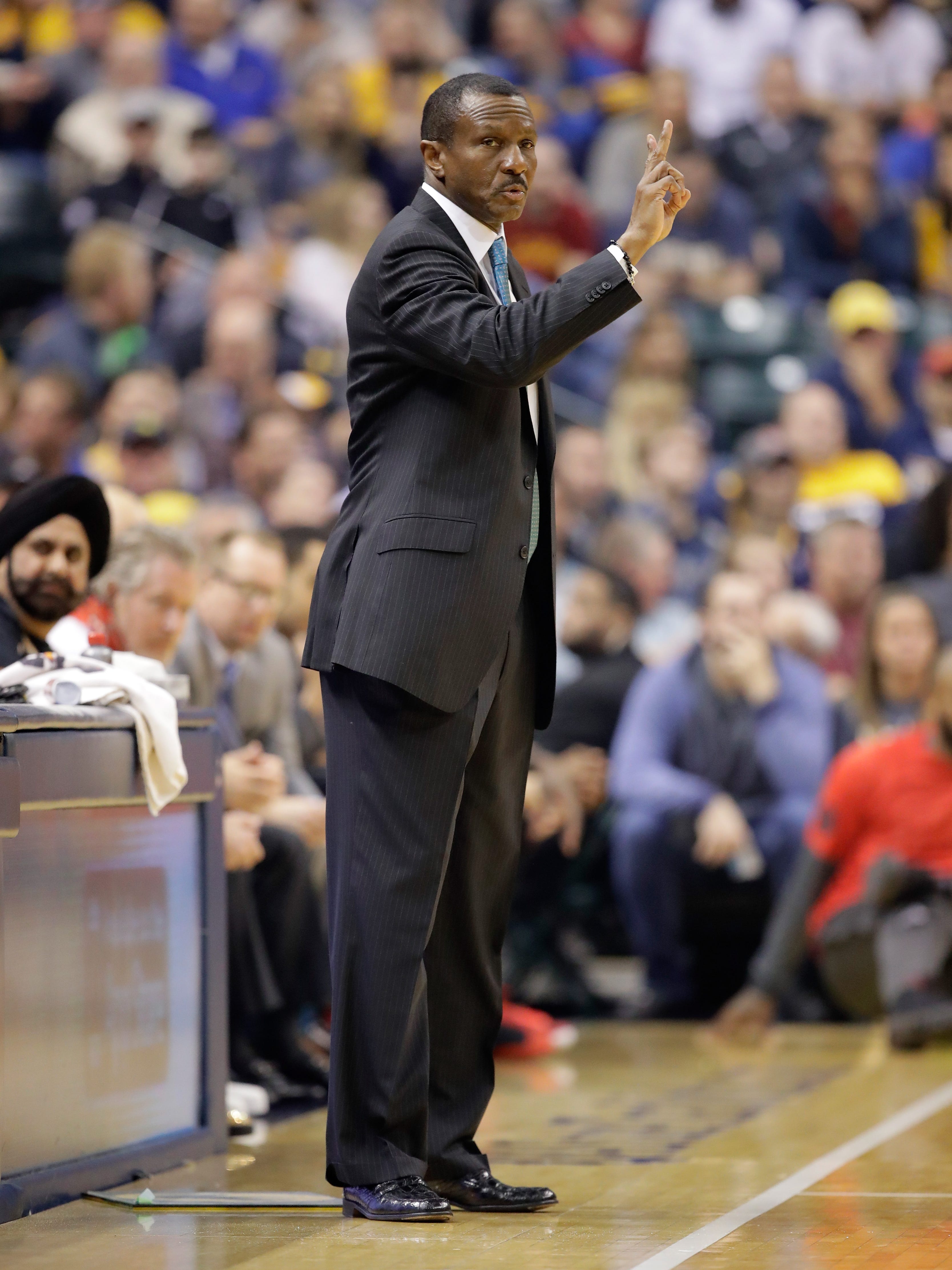 Dwane Casey the head coach of the Toronto Raptors gives instructions to his team against the Indiana Pacers at Bankers Life Fieldhouse on April 4, 2017 in Indianapolis, Indiana.