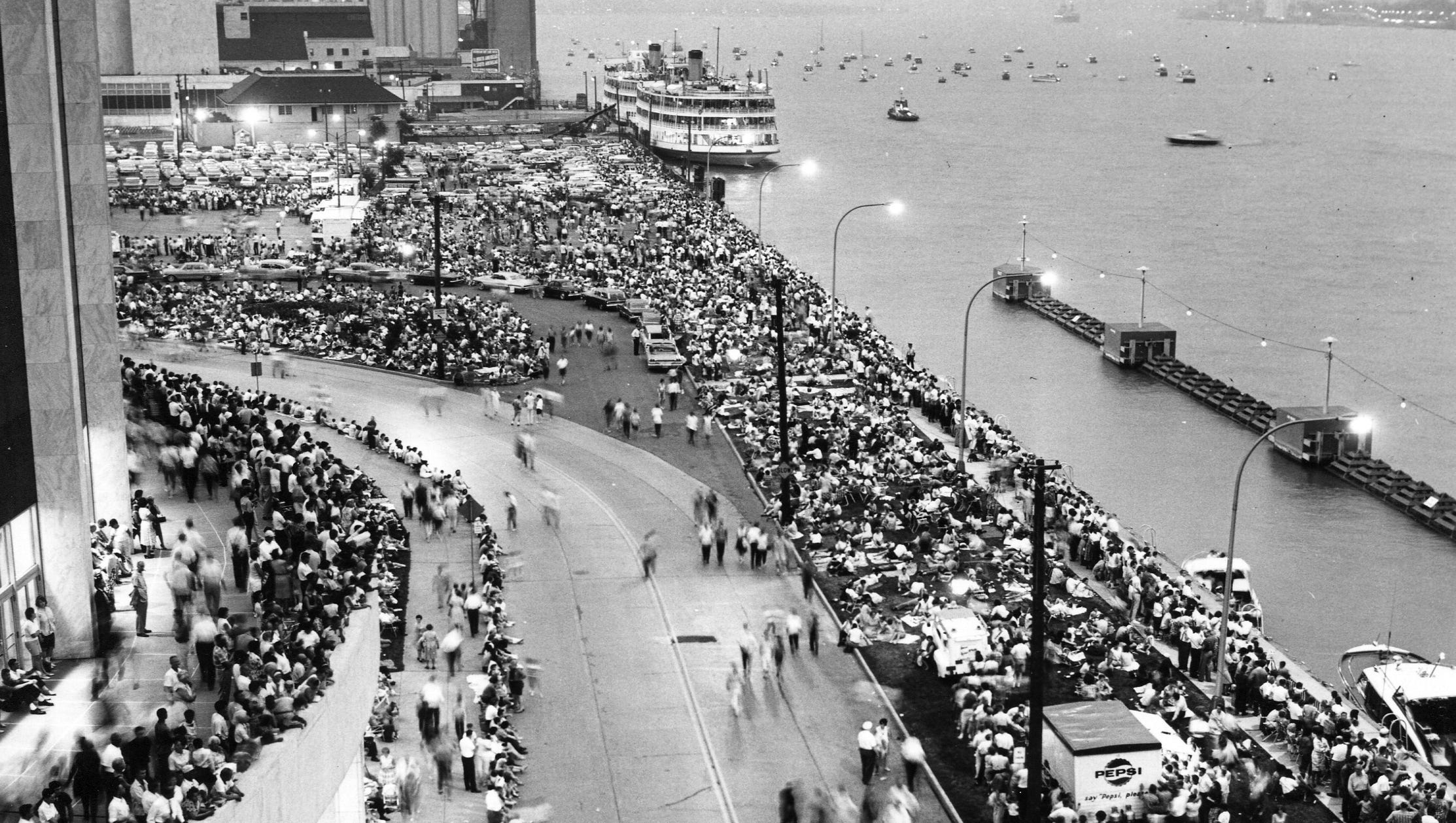 Crowds gather outside Cobo along the Detroit River for the Freedom Festival on July 2, 1964.