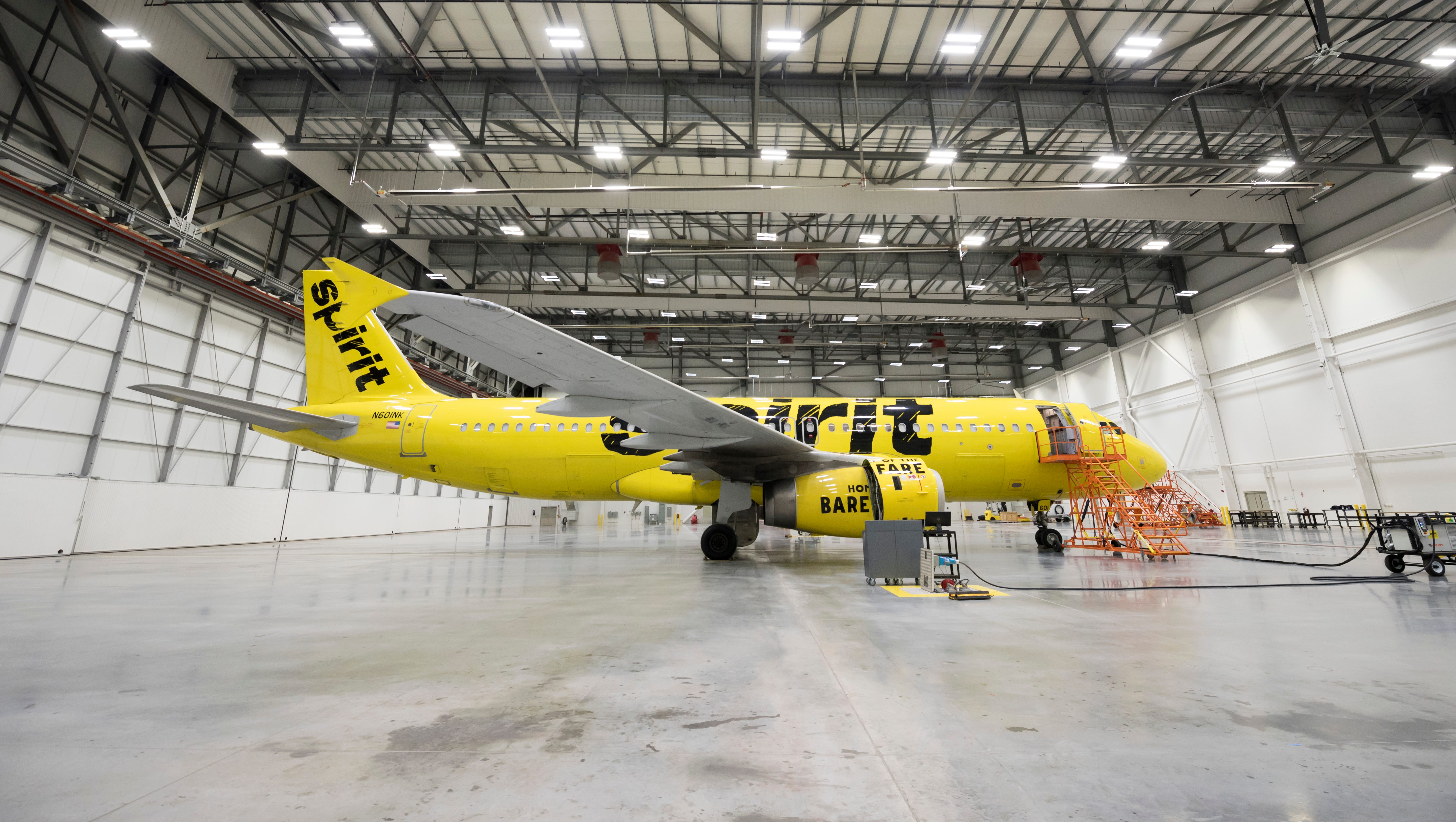 An A320 "operational spare" airplane sits in the main hangar bay for the new maintenance hangar for Spirit Airlines.