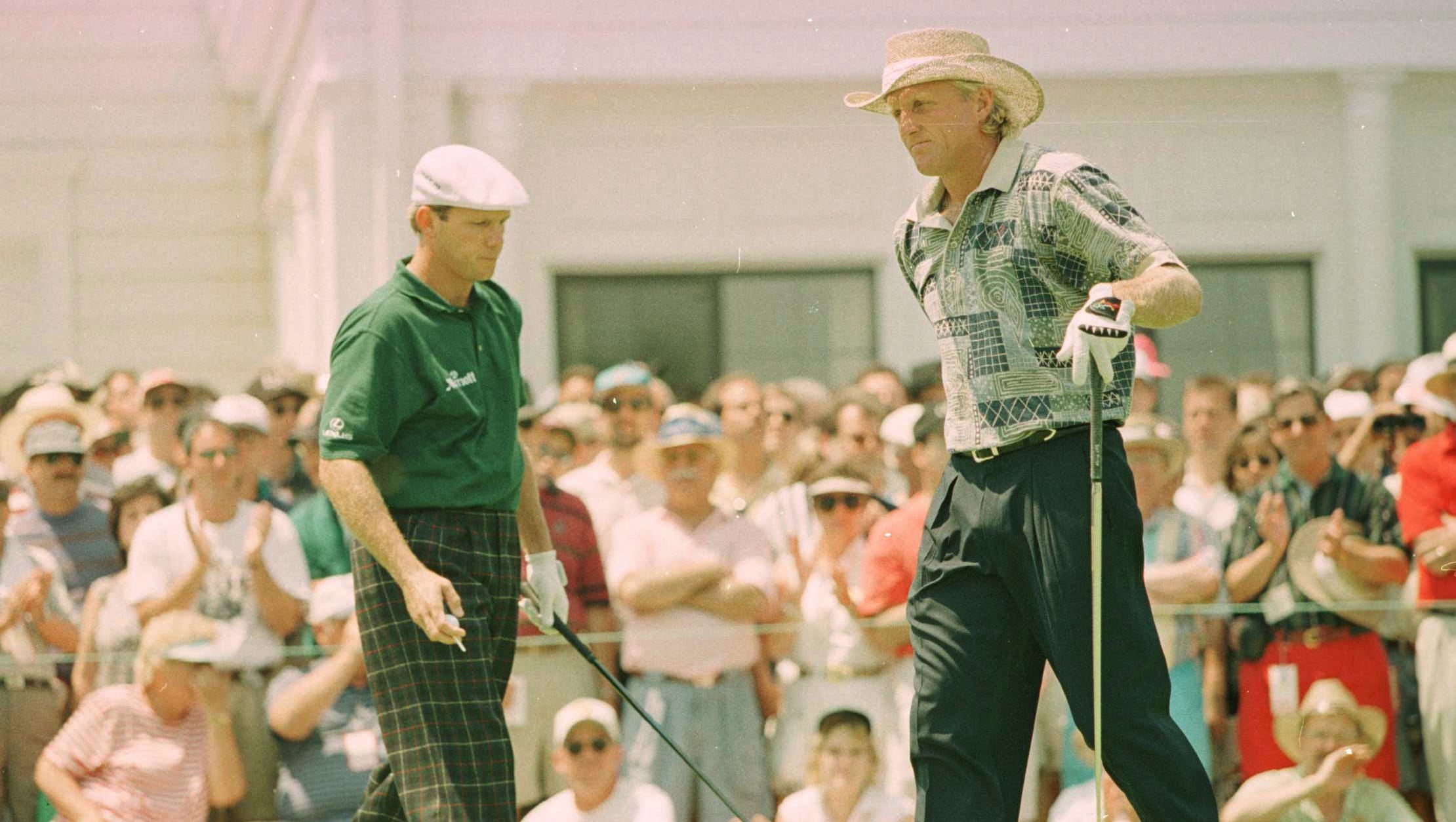 Payne Stewart takes the tee after Greg Norman during the third round of the 1996 U.S. Open at Oakland Hills.