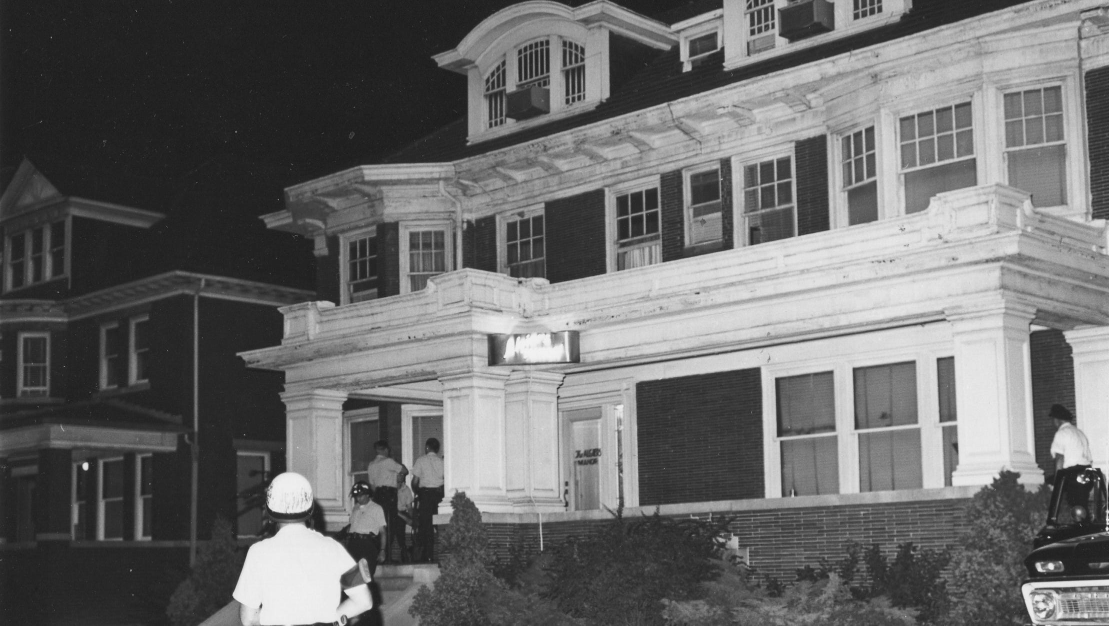Police are seen during the night of July 25-26, 1967, at the three-story annex of the Algiers Motel in Detroit, where three young black men were found slain during the 1967 uprising.