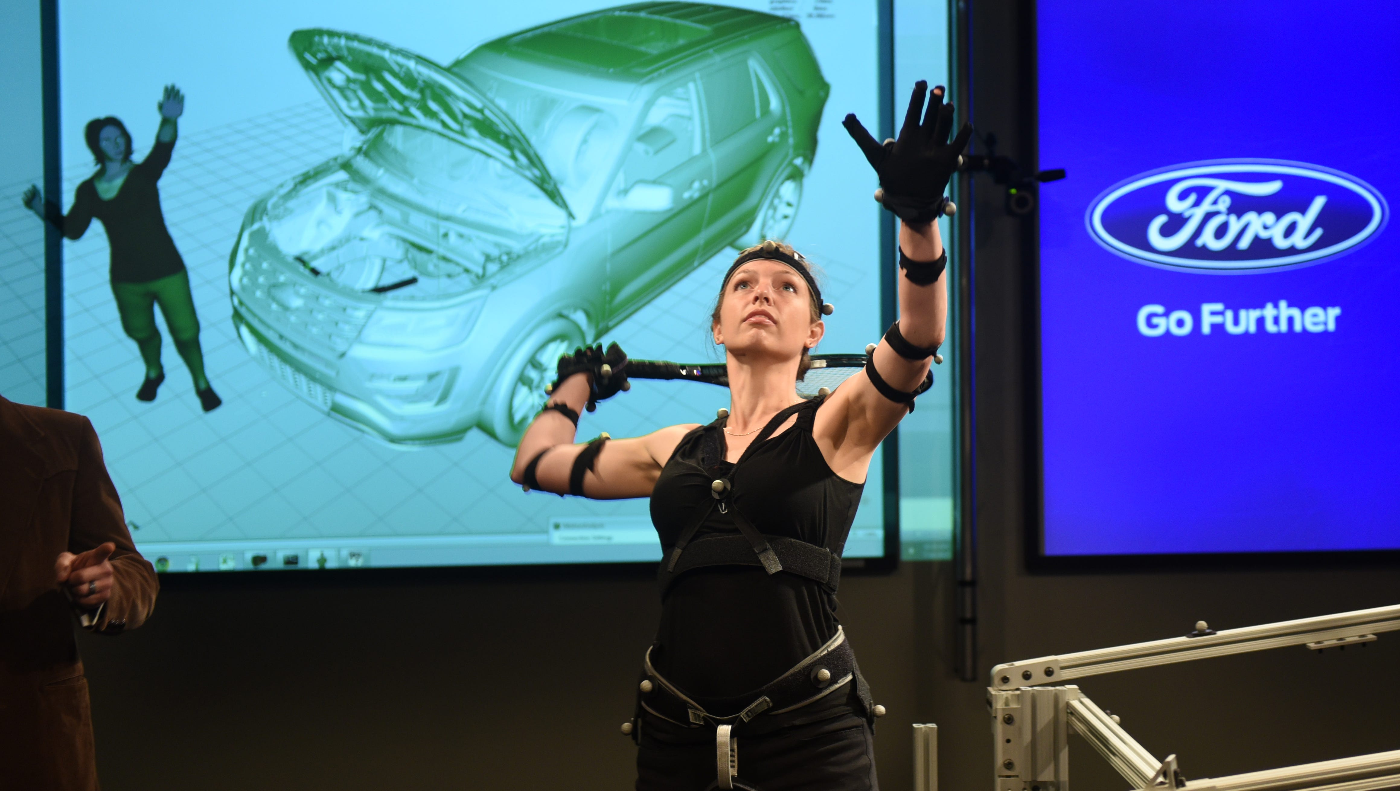Kali Gawinski demonstrates the full body motion capture part of Ford Motor Co.'s Virtual Manufacturing Technology.