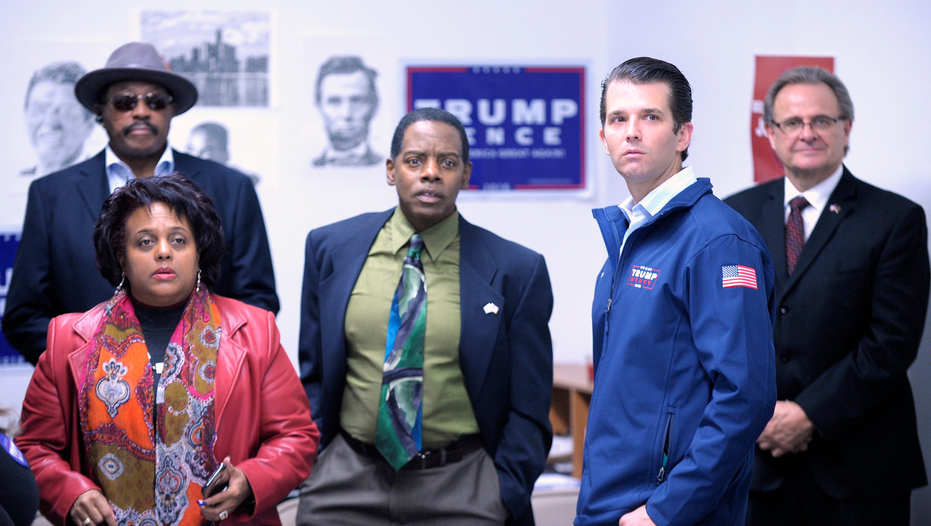 Donald Trump Jr., right, radio commentator, Ron Edwards, center, and his wife, Denise Edwards, left, both of Royal Oak, talk before the event. More than 30 people at the African American Community Leaders breakfast listen to Donald Trump Jr. campaign for his father, the Republican presidential candidate, at the Detroit Republican Party headquarters on Livernois near Seven Mile,  Nov. 2, 2016.