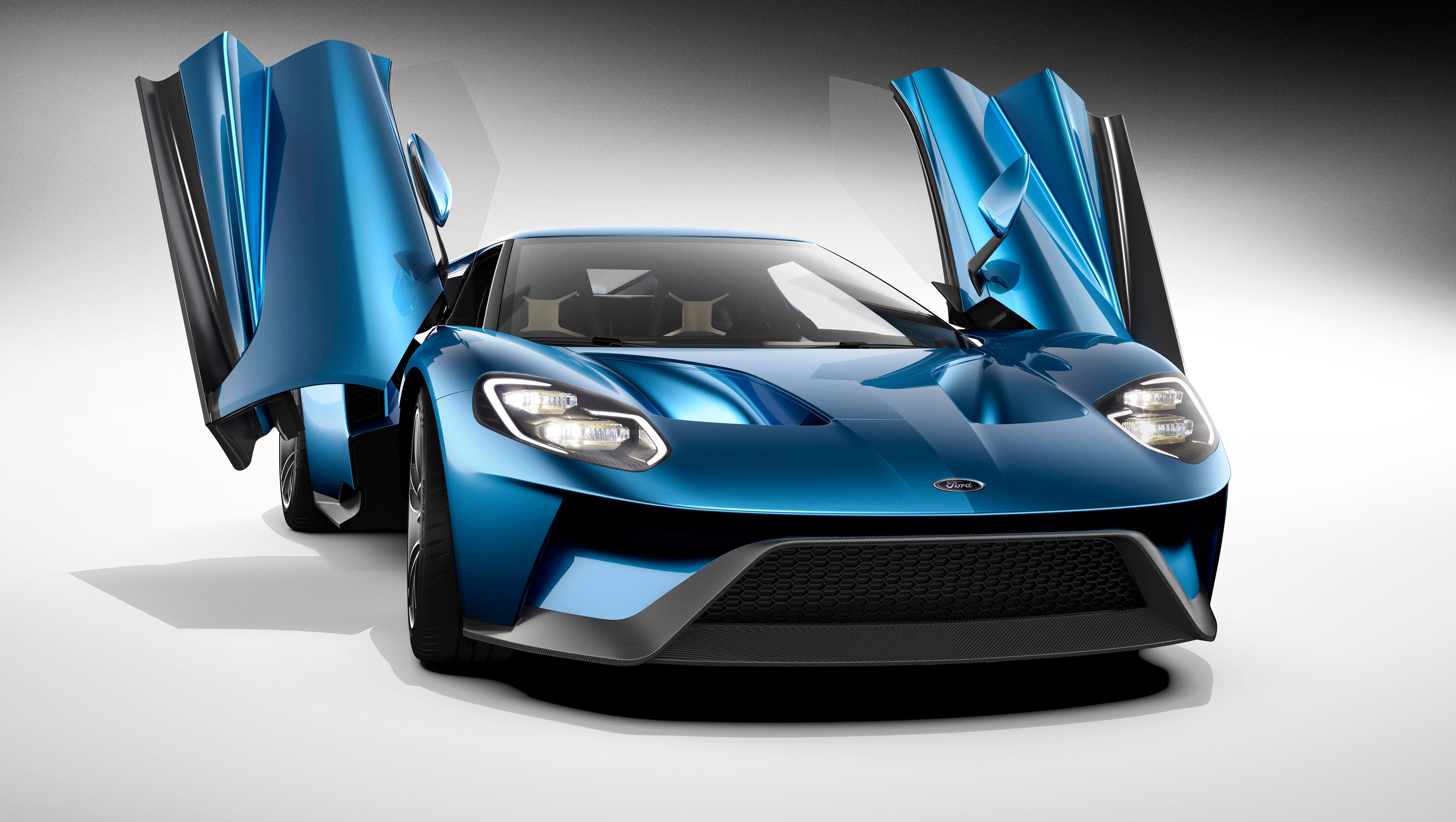 The interior on the  two-seat, carbon-fiber, mid-engined Ford GT supercar is accessed by upward-swinging doors.