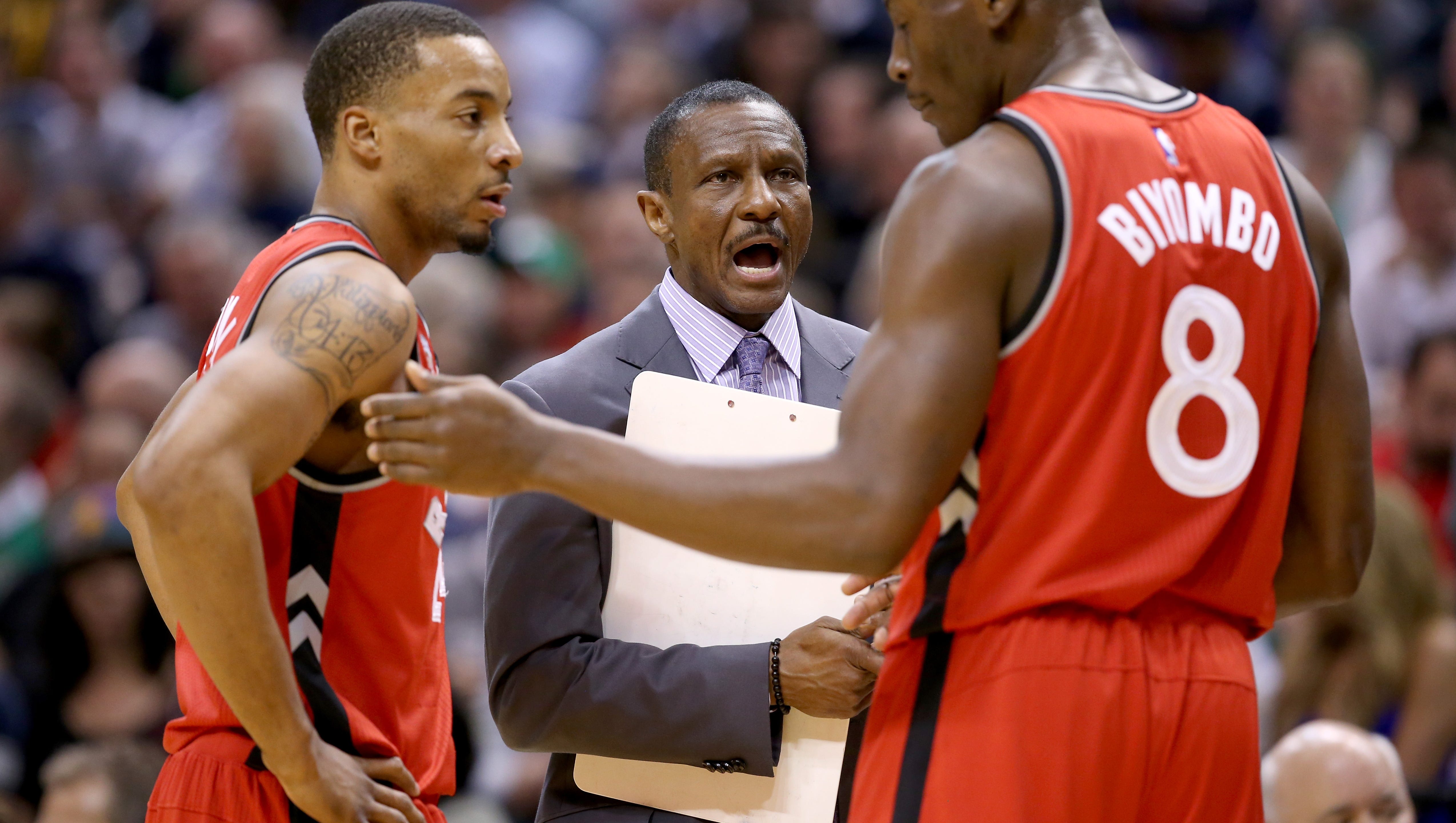 Dwane Casey the head coach of the Toronto Raptors gives instructions to his team against the Indiana Pacers during the game at Bankers Life Fieldhouse on March 17, 2016 in Indianapolis, Indiana.