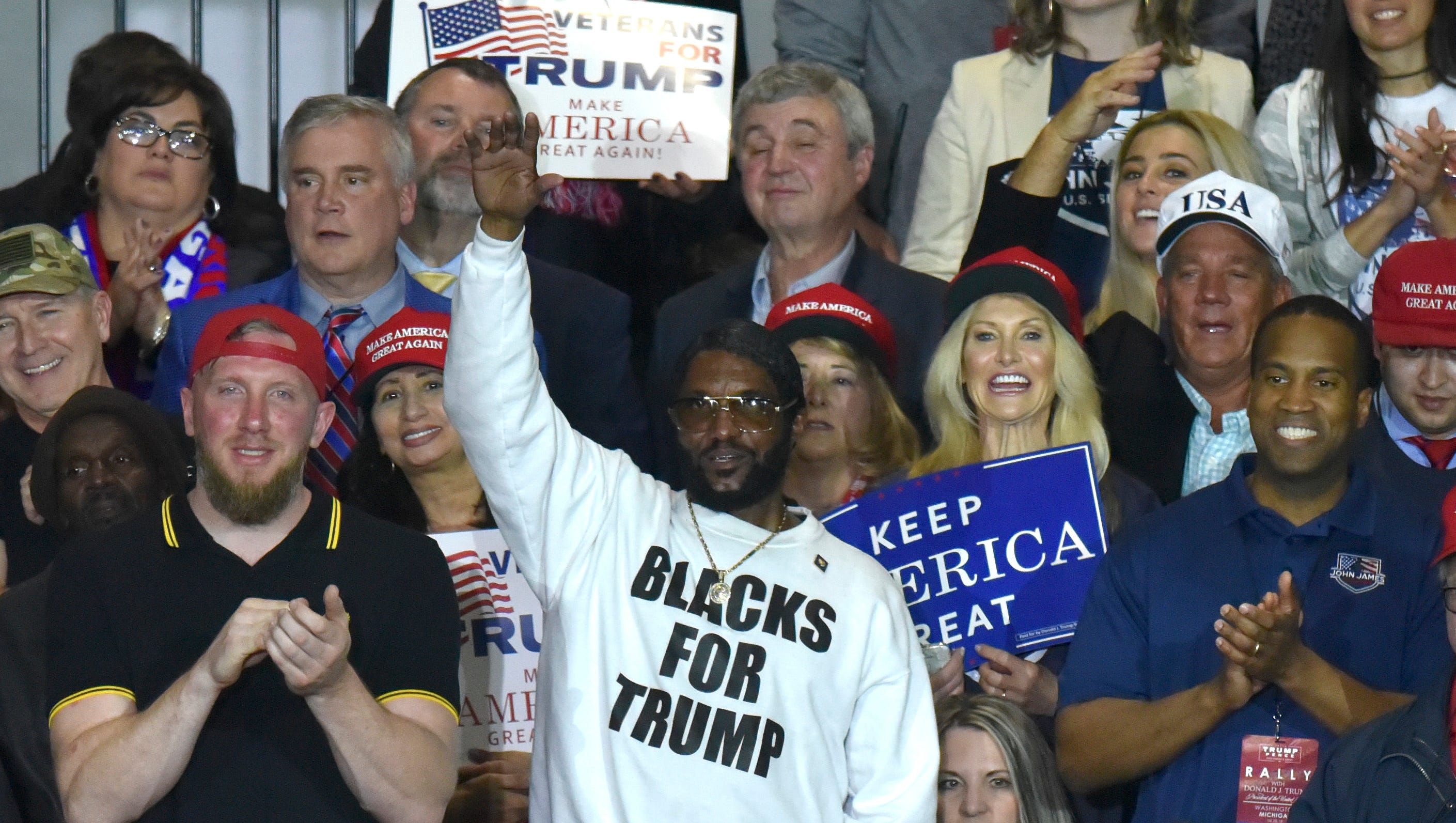 Maurice Symonette, of Miami, Florida, wears a Blacks For Trump shirt. He was proud to say he flew in from Miami for this event.